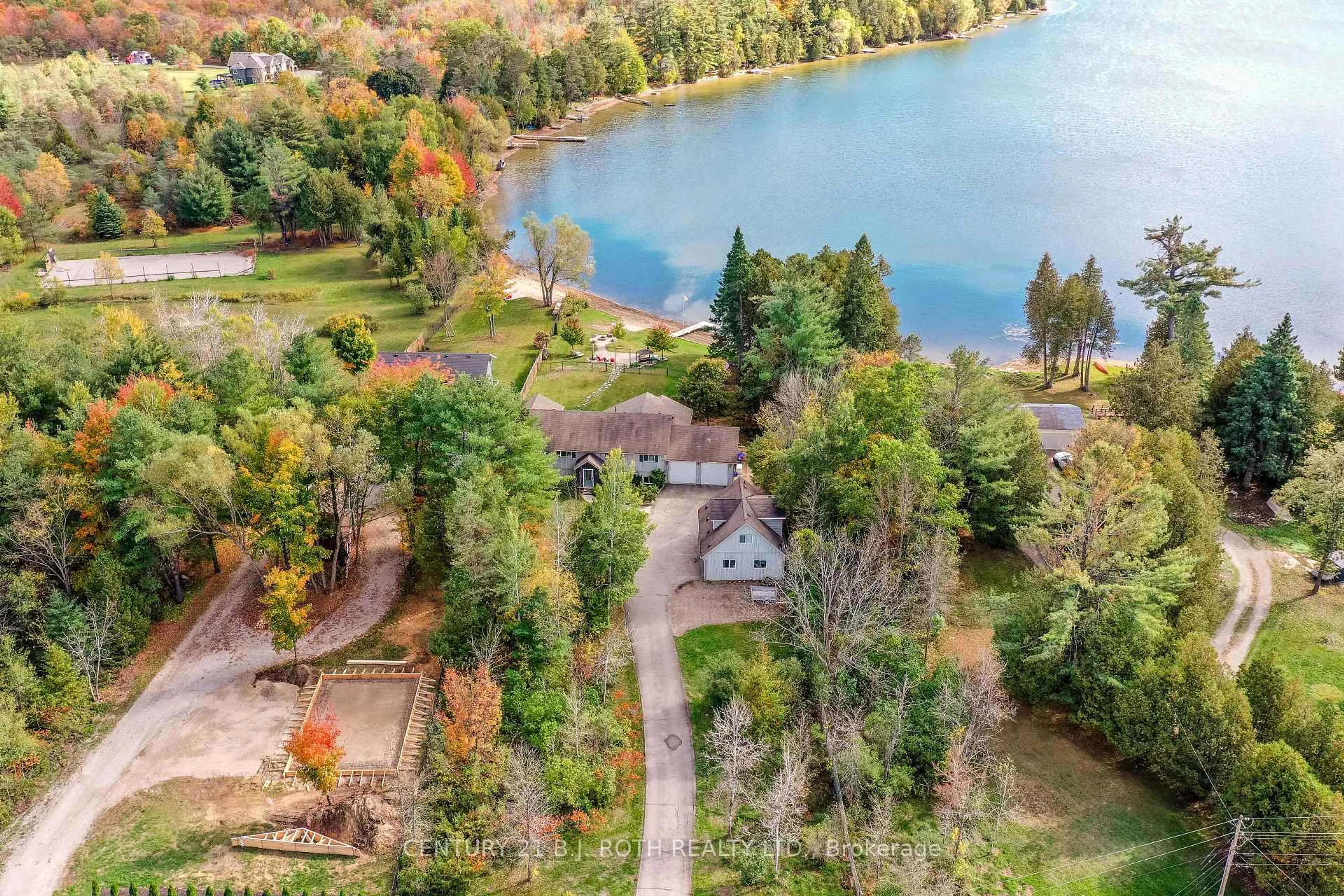 A pic from outside/outdoor area/front of a property/back of a property/a pic from drone, water/lake/river/ocean view for 3371 Lake St. George Blvd, Severn Ontario L0K 2B0