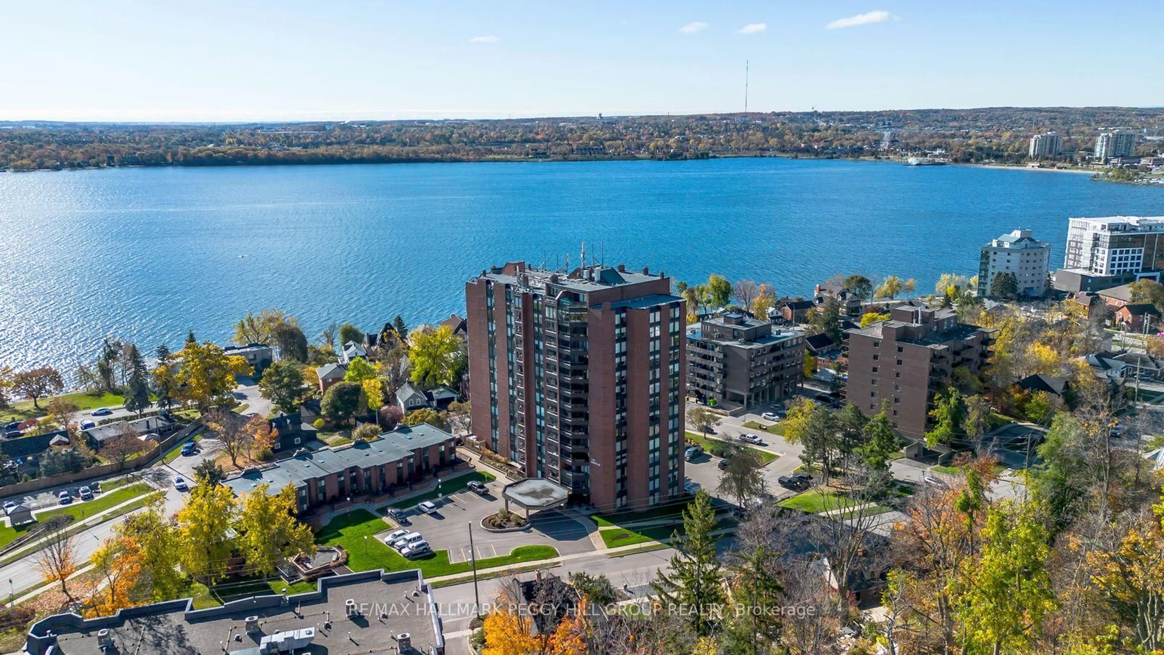 A pic from outside/outdoor area/front of a property/back of a property/a pic from drone, water/lake/river/ocean view for 181 Collier St #206, Barrie Ontario L4M 5L6
