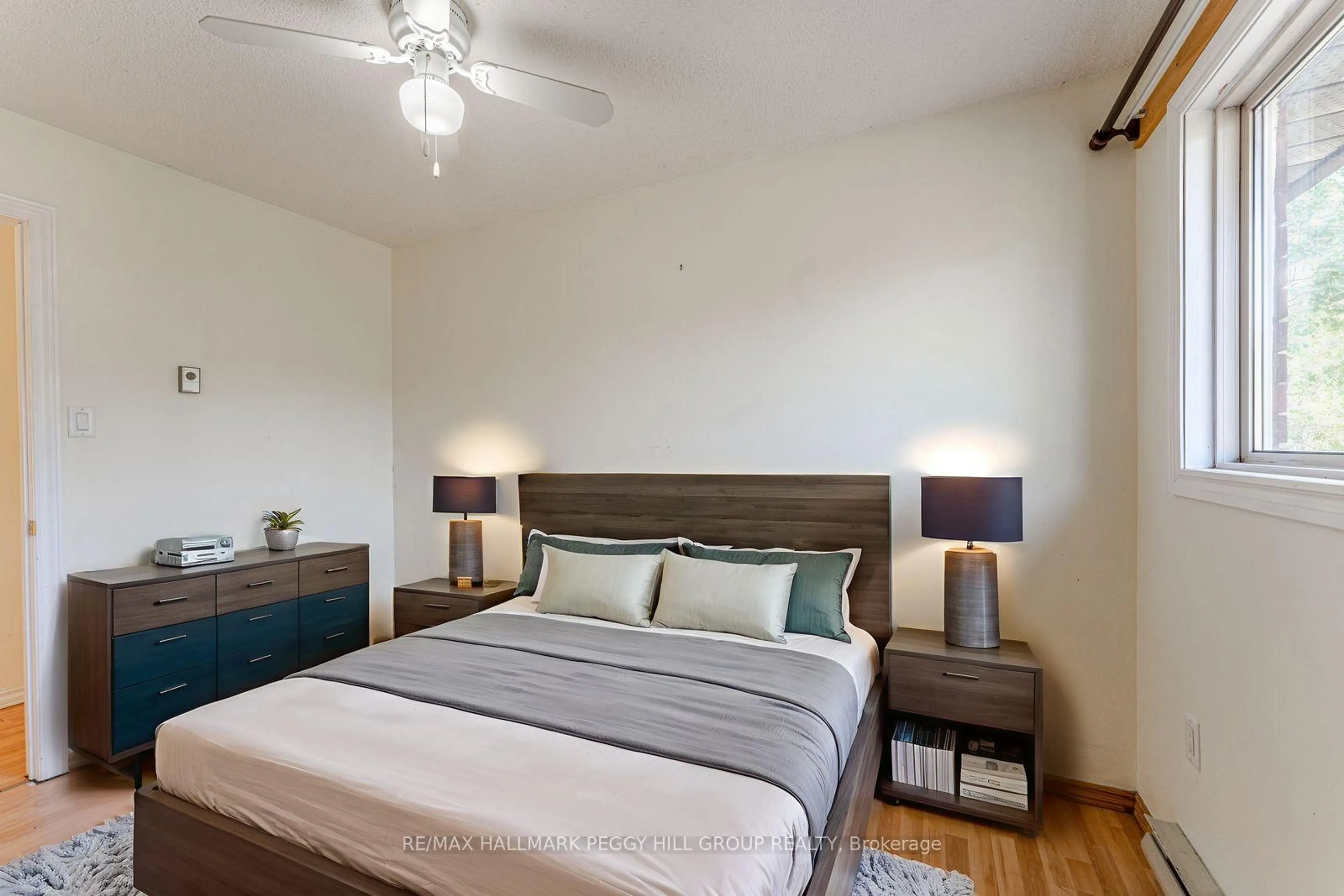 Bedroom with bed, wood/laminate floor for 21 Evergreen Crt #7, Barrie Ontario L4N 6W8