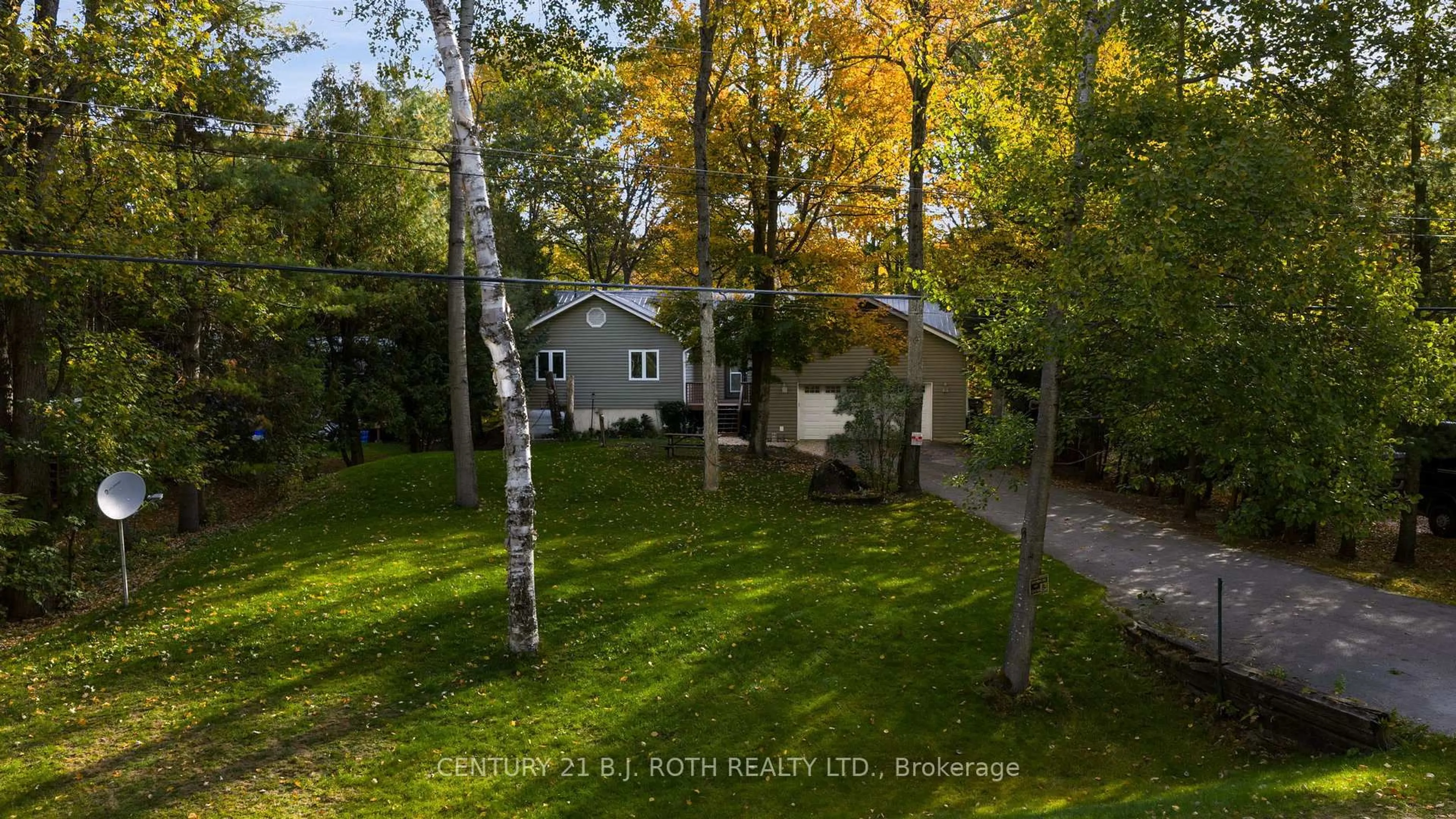 A pic from outside/outdoor area/front of a property/back of a property/a pic from drone, forest/trees view for 7333 Davy Dr, Ramara Ontario L0K 2B0