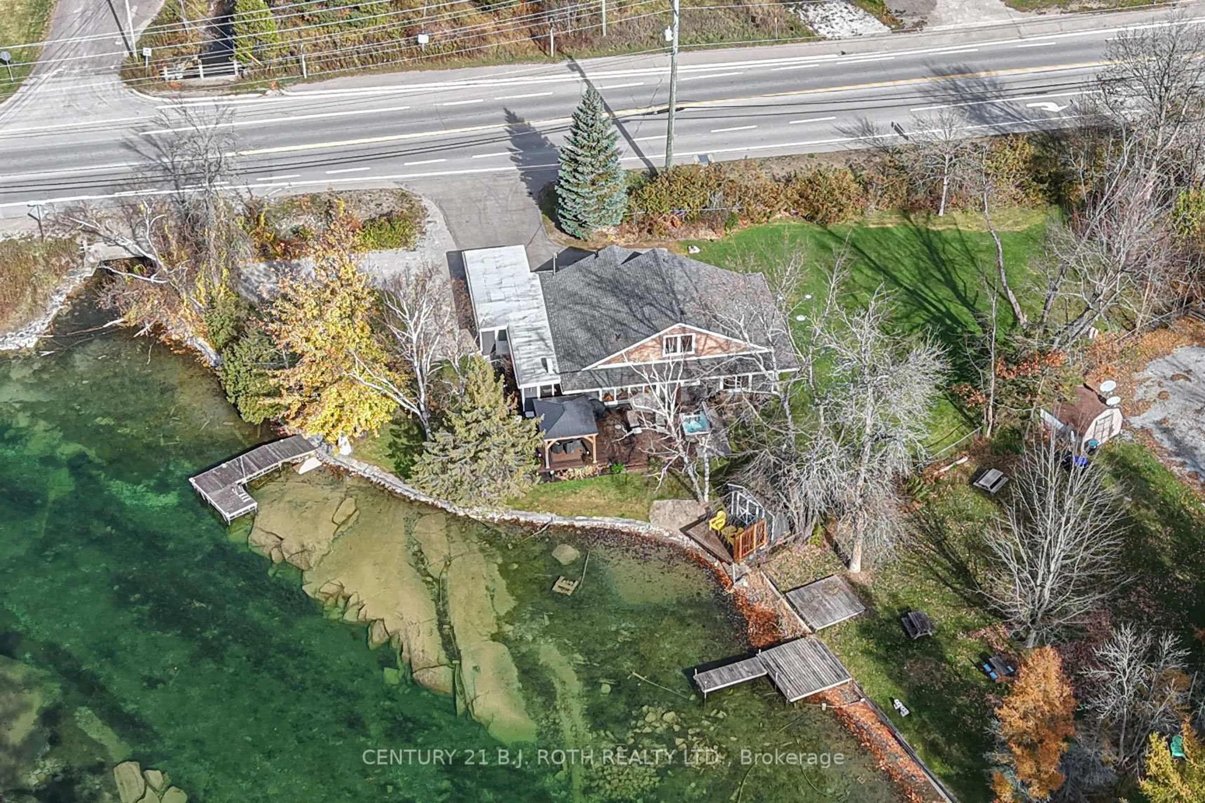 A pic from outside/outdoor area/front of a property/back of a property/a pic from drone, street for 8222 169 COUNTY Rd, Ramara Ontario L0K 2B0