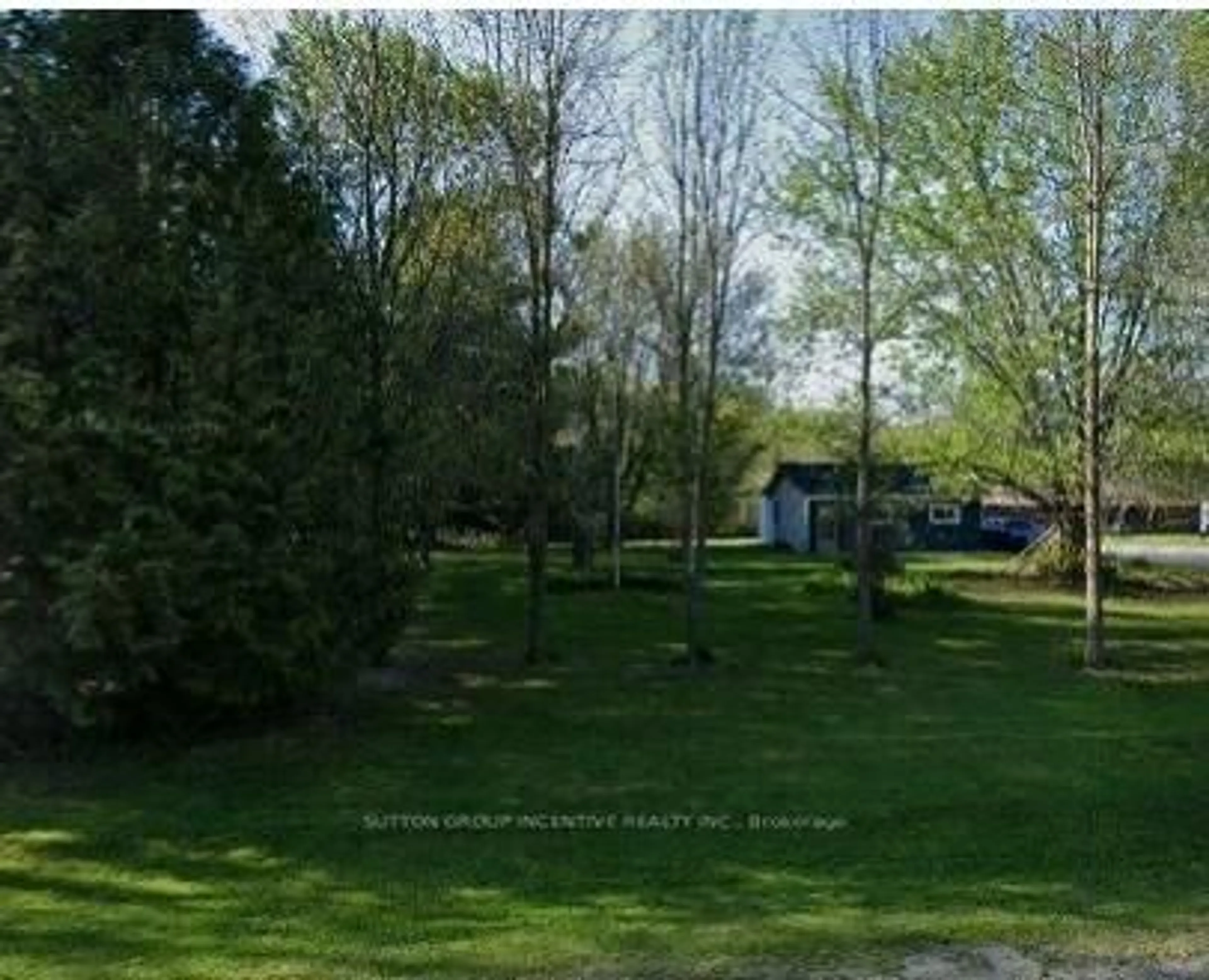 A pic from outside/outdoor area/front of a property/back of a property/a pic from drone, forest/trees view for 4067 Airport Rd, Ramara Ontario L3V 6H6