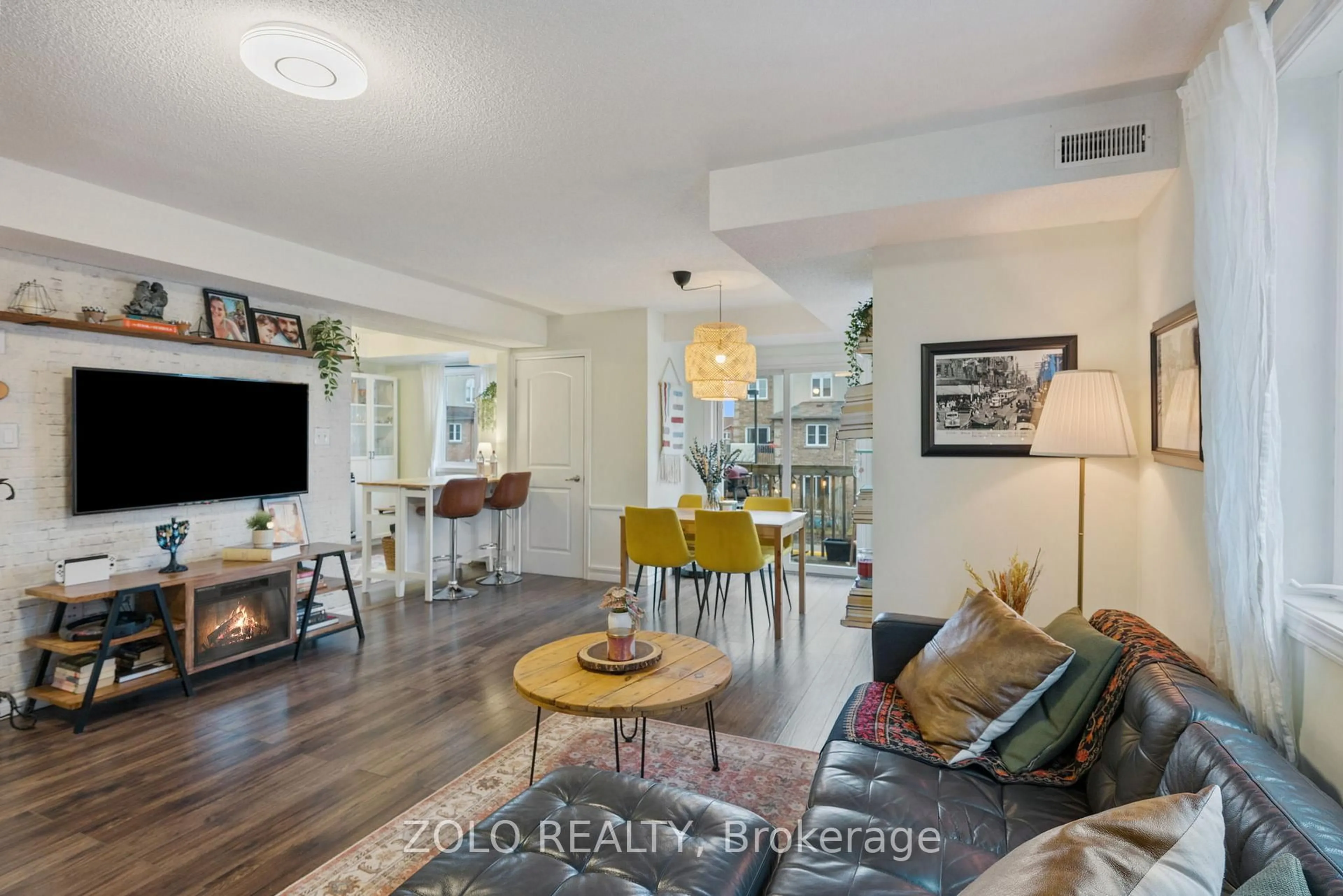 Living room with furniture, unknown for 13 Cheltenham Rd #2, Barrie Ontario L4M 0E7