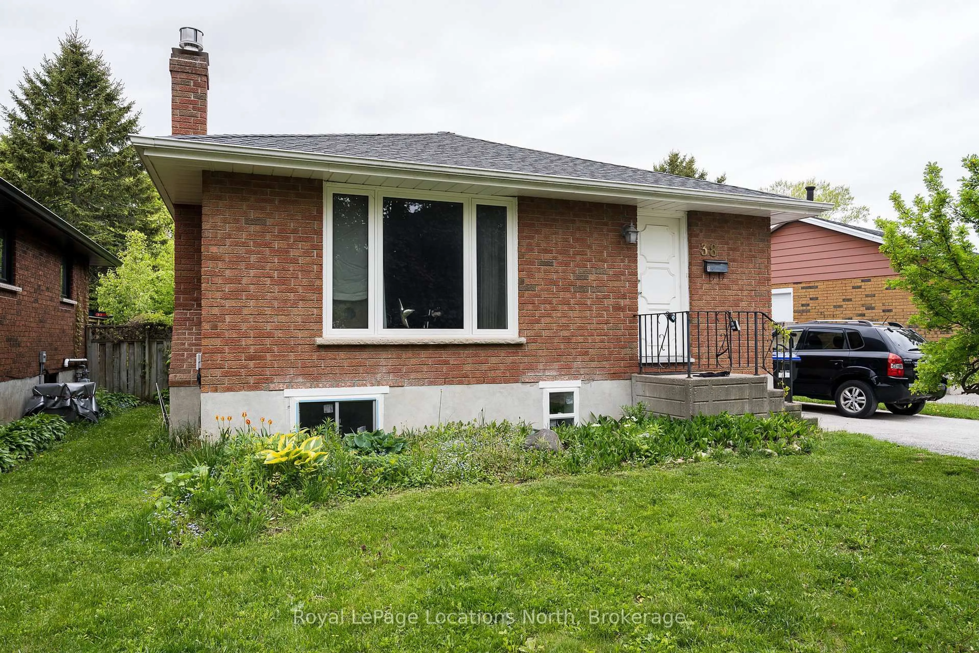 Home with brick exterior material, street for 38 Sproule Ave, Collingwood Ontario L9Y 4L5