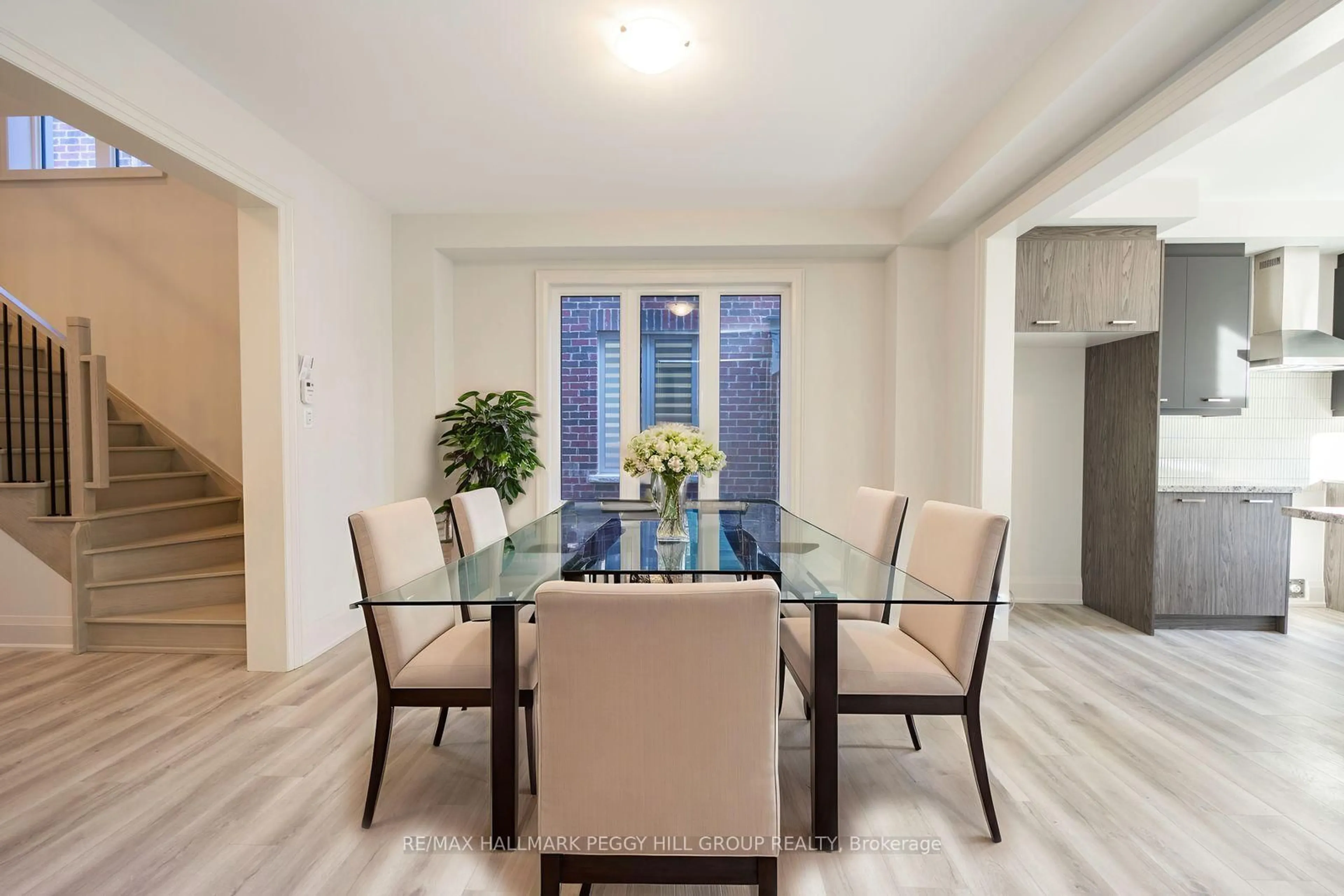 Dining room, wood/laminate floor for 176 Durham Ave, Barrie Ontario L9J 0Z4