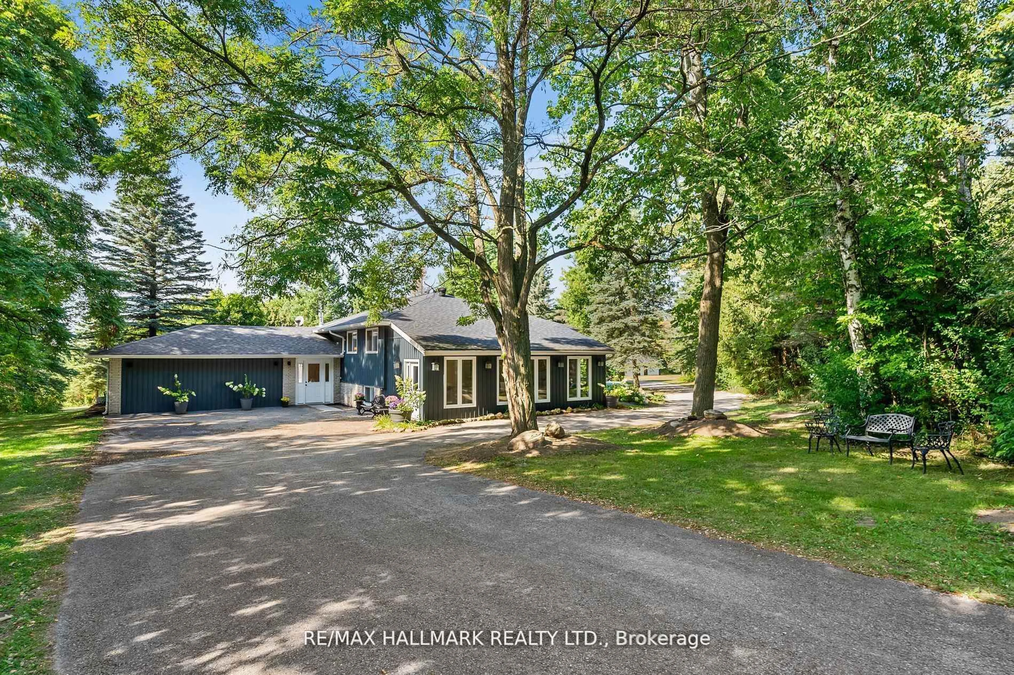A pic from outside/outdoor area/front of a property/back of a property/a pic from drone, street for 2422 Snow Valley Rd, Springwater Ontario L9X 1K1
