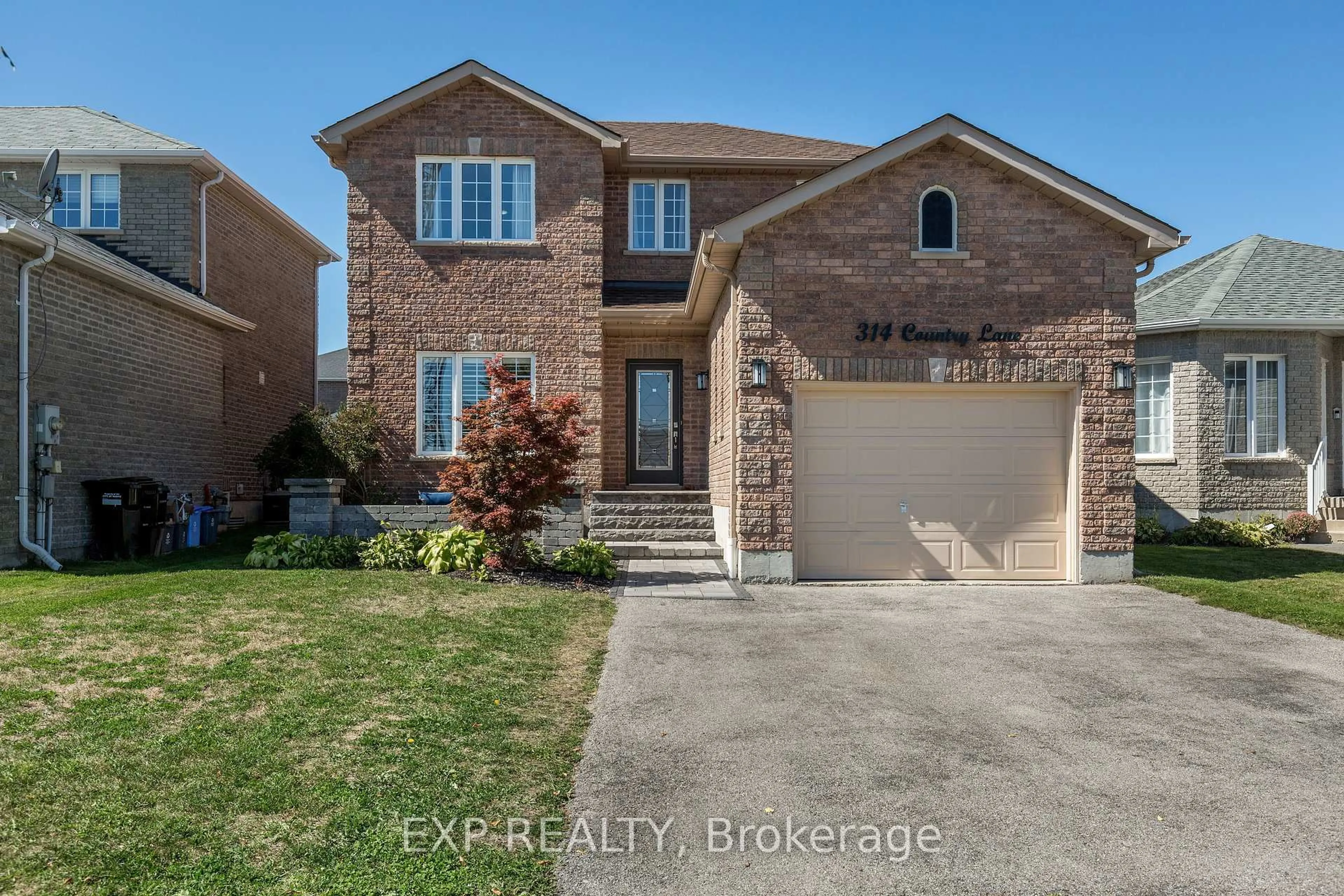 Home with brick exterior material, street for 314 Country Lane, Barrie Ontario L4N 5Z6