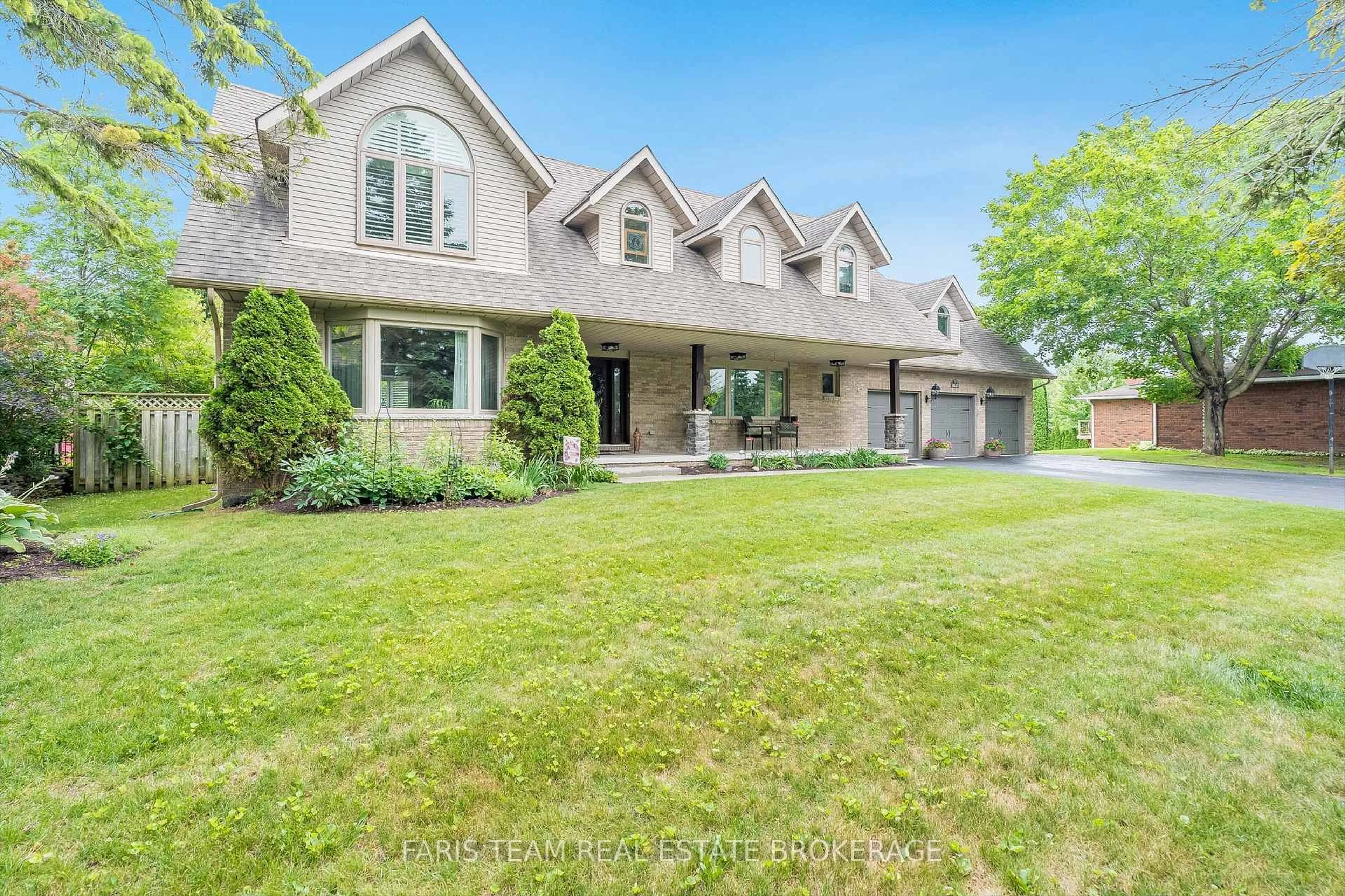 Home with brick exterior material, street for 32 Cairns Blvd, Springwater Ontario L9X 0N8