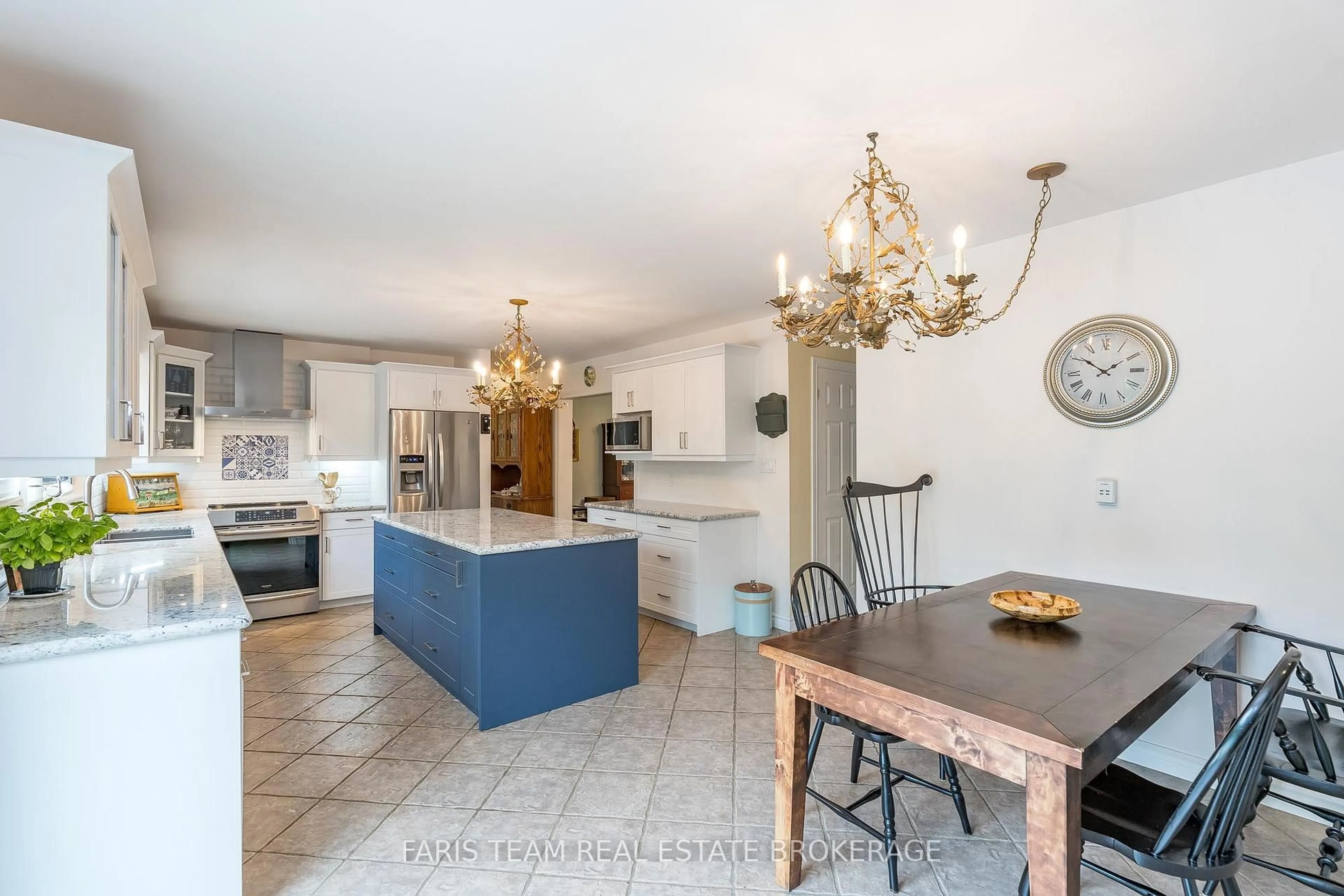 Open concept kitchen, ceramic/tile floor for 32 Cairns Blvd, Springwater Ontario L9X 0N8