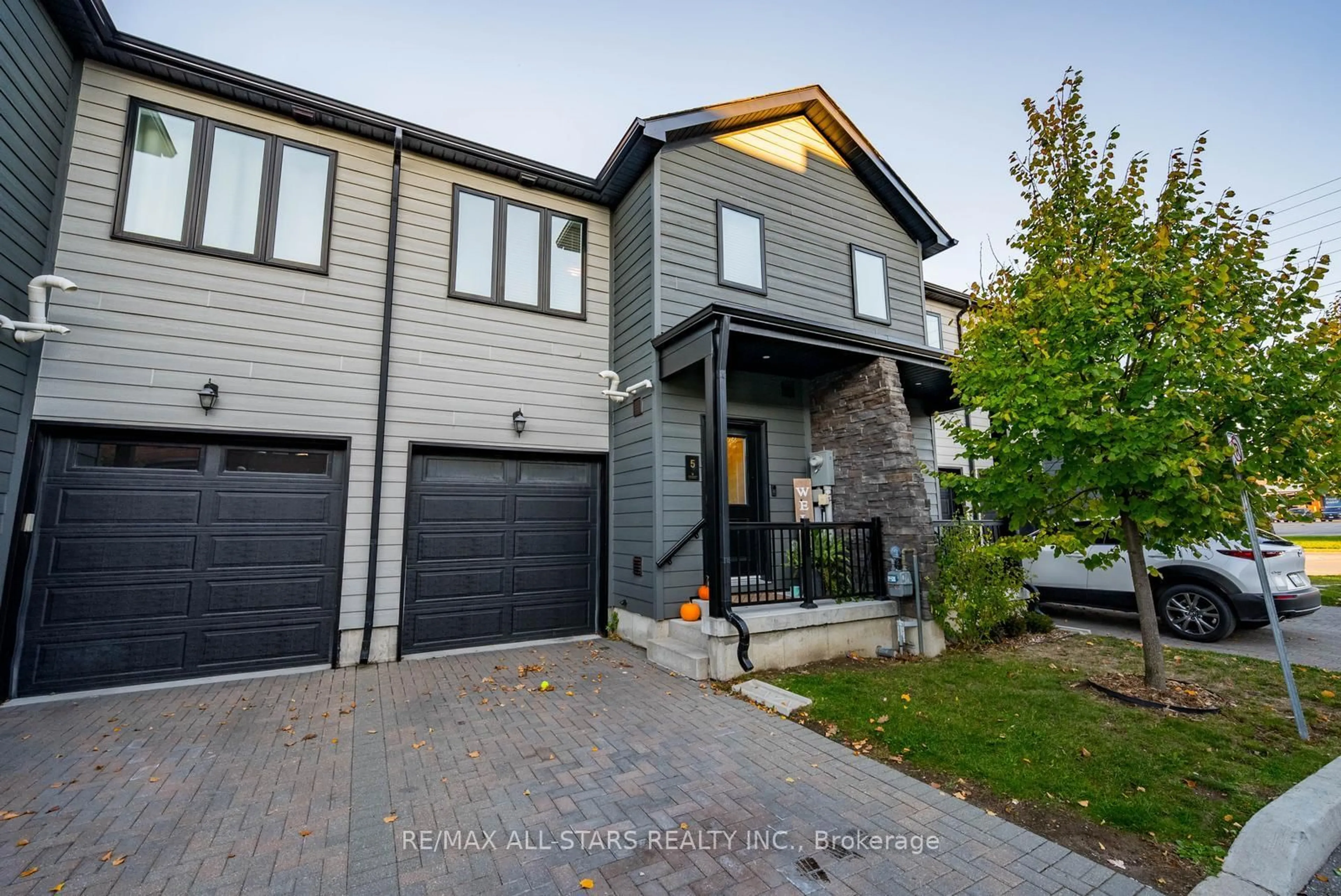 Home with brick exterior material, street for 5 Stonehart Lane #20, Barrie Ontario L4M 7E8