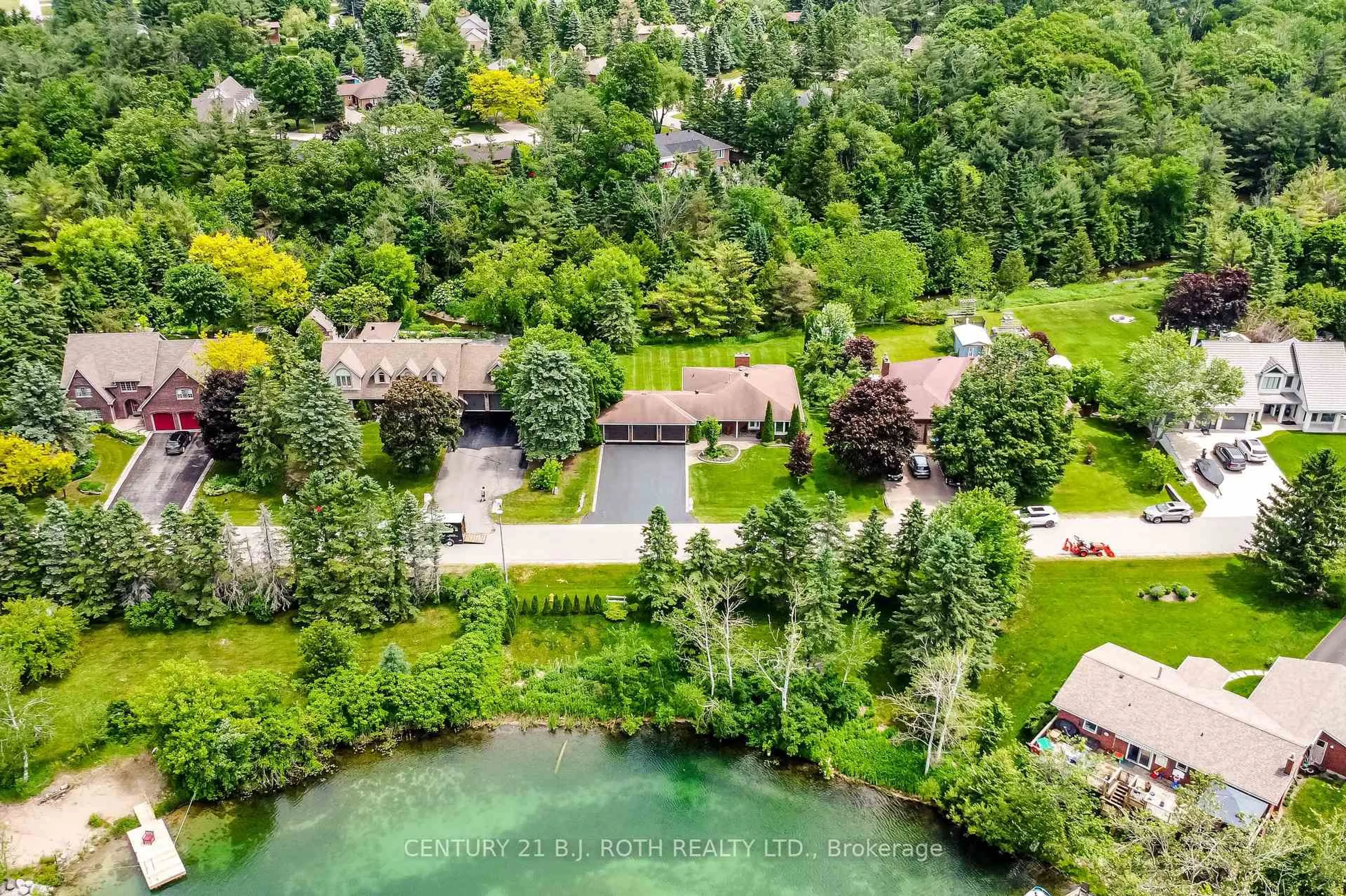 A pic from outside/outdoor area/front of a property/back of a property/a pic from drone, water/lake/river/ocean view for 34 Cairns Blvd, Springwater Ontario L9X 0N8