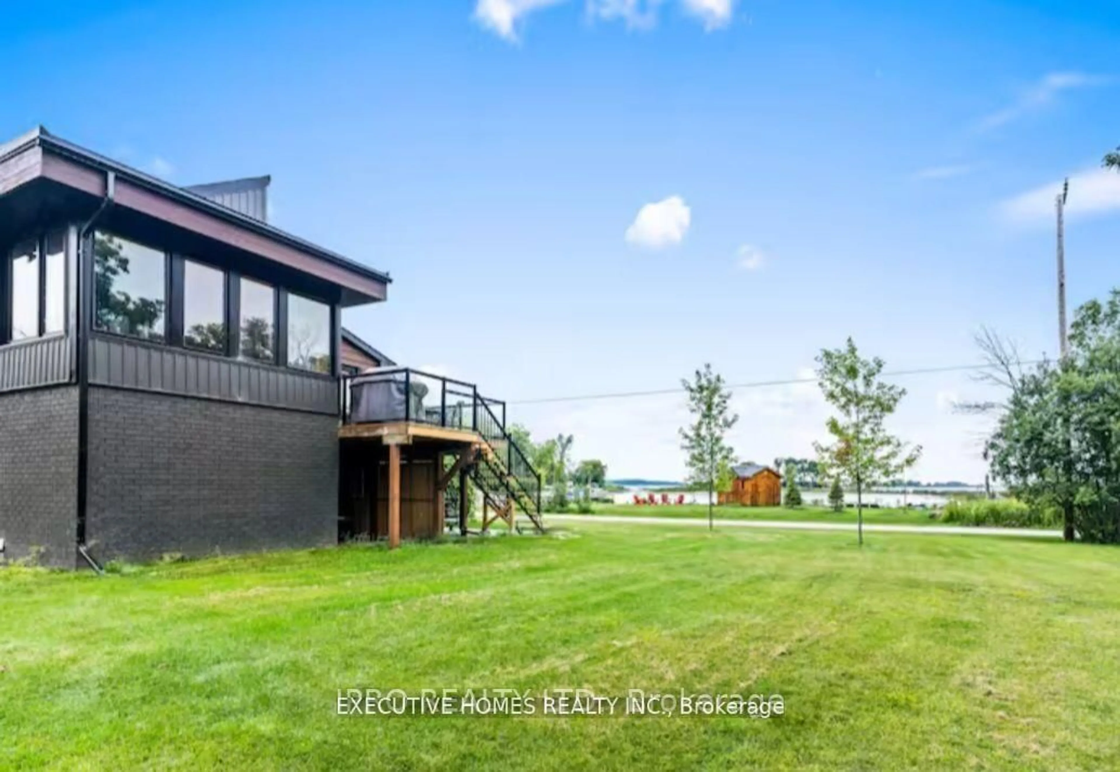 A pic from outside/outdoor area/front of a property/back of a property/a pic from drone, water/lake/river/ocean view for 39 Long Point Rd, Tay Ontario L0K 2C0