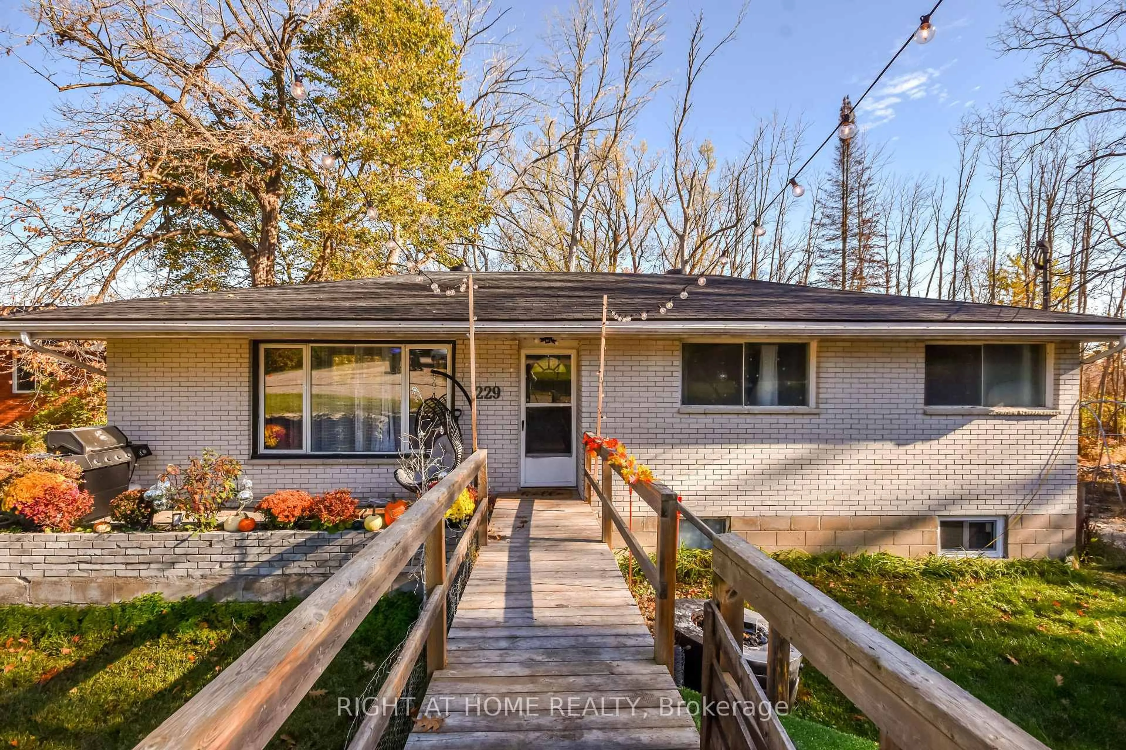 Home with vinyl exterior material, street for 229 Mountain Ave, Tay Ontario L0K 2C0