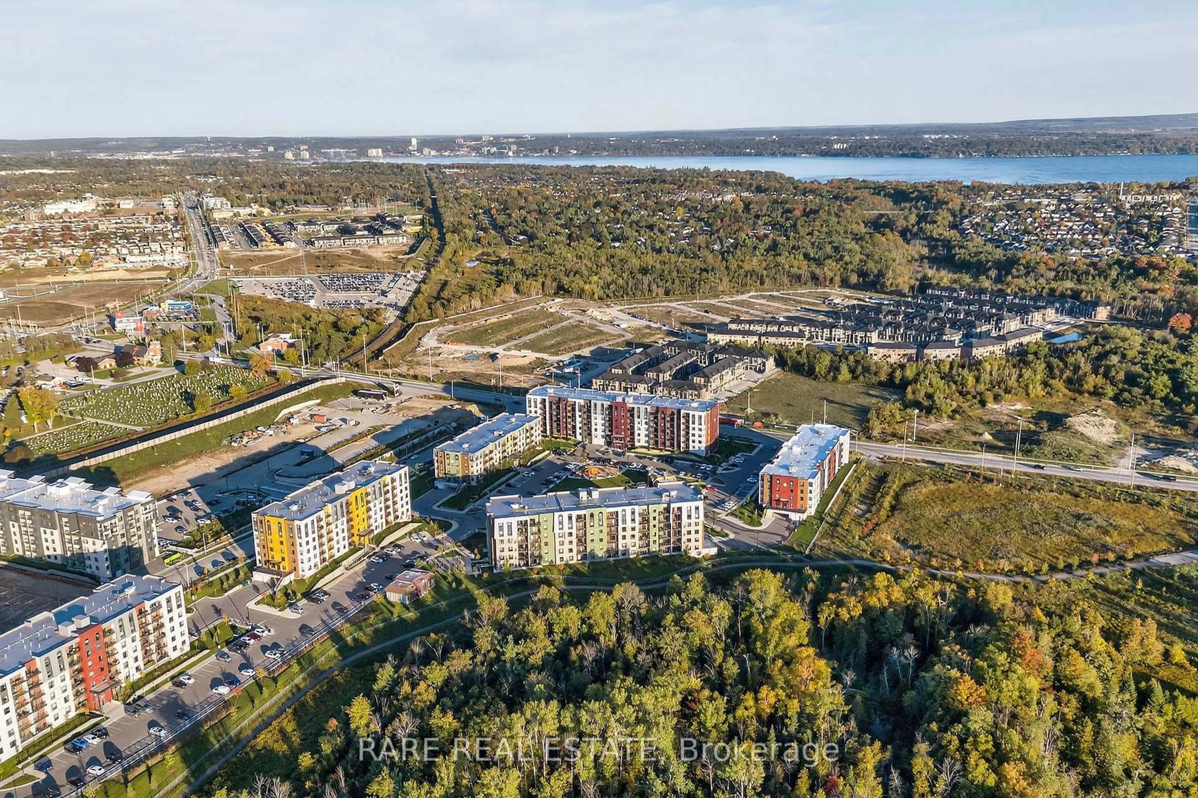 A pic from outside/outdoor area/front of a property/back of a property/a pic from drone, unknown for 5 Chef Lane #402, Barrie Ontario L9J 0J8