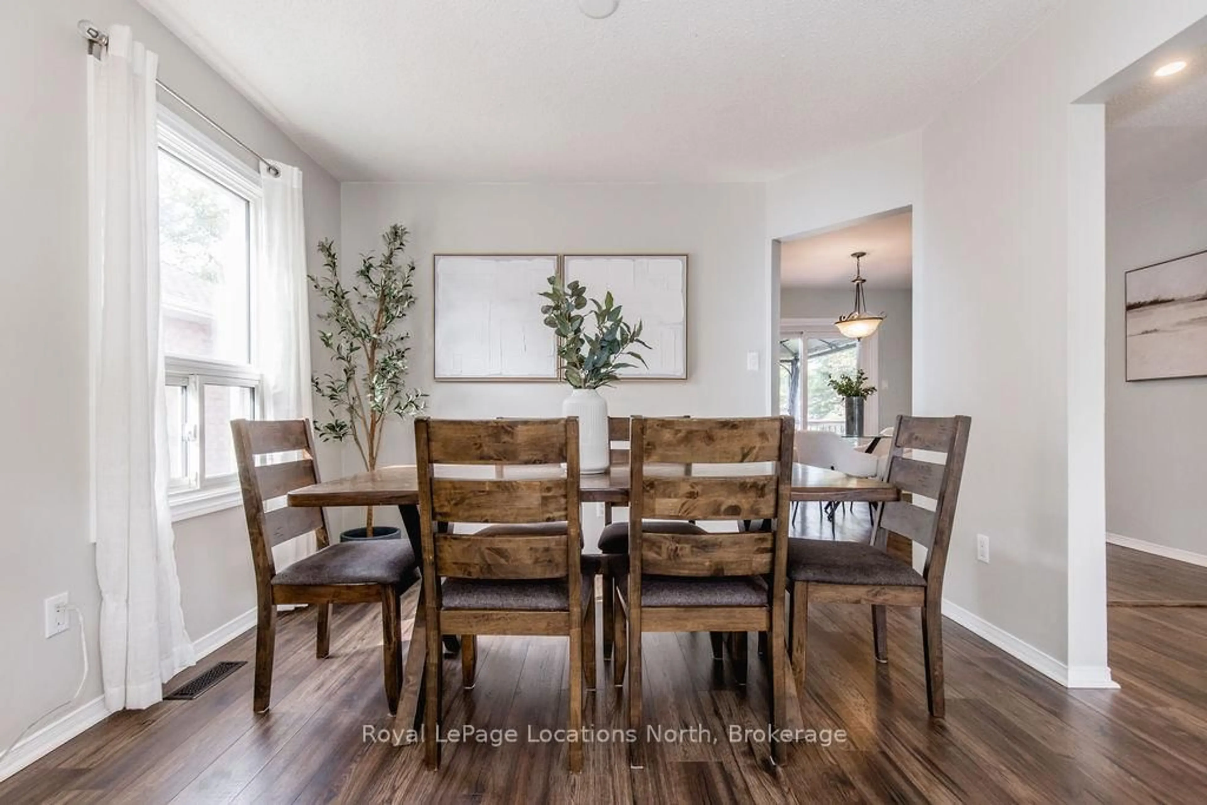 Dining room, wood/laminate floor for 52 ROYAL BEECH Dr, Wasaga Beach Ontario L0L 2P0