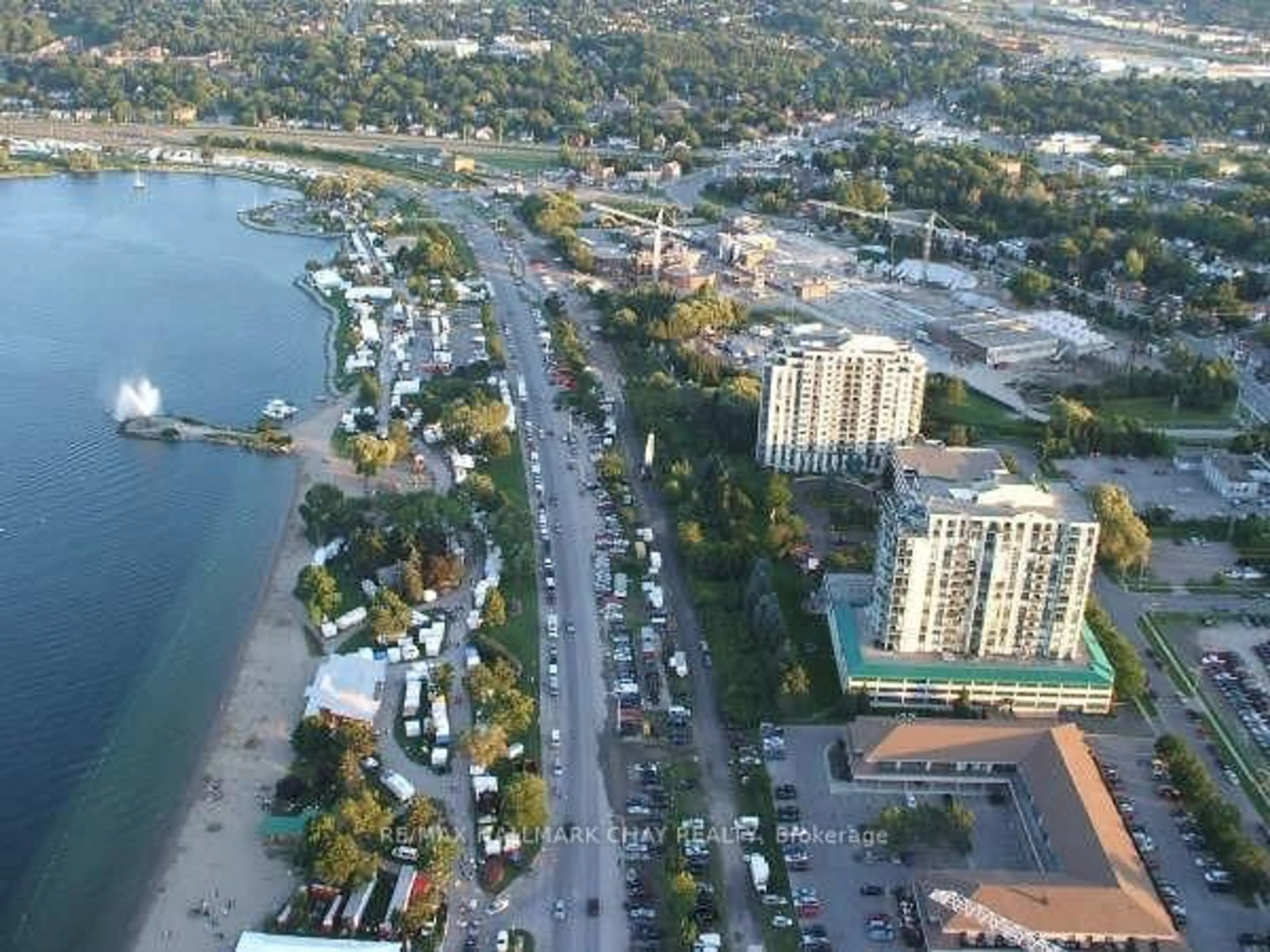 A pic from outside/outdoor area/front of a property/back of a property/a pic from drone, water/lake/river/ocean view for 65 Ellen St #908, Barrie Ontario L4N 3A5