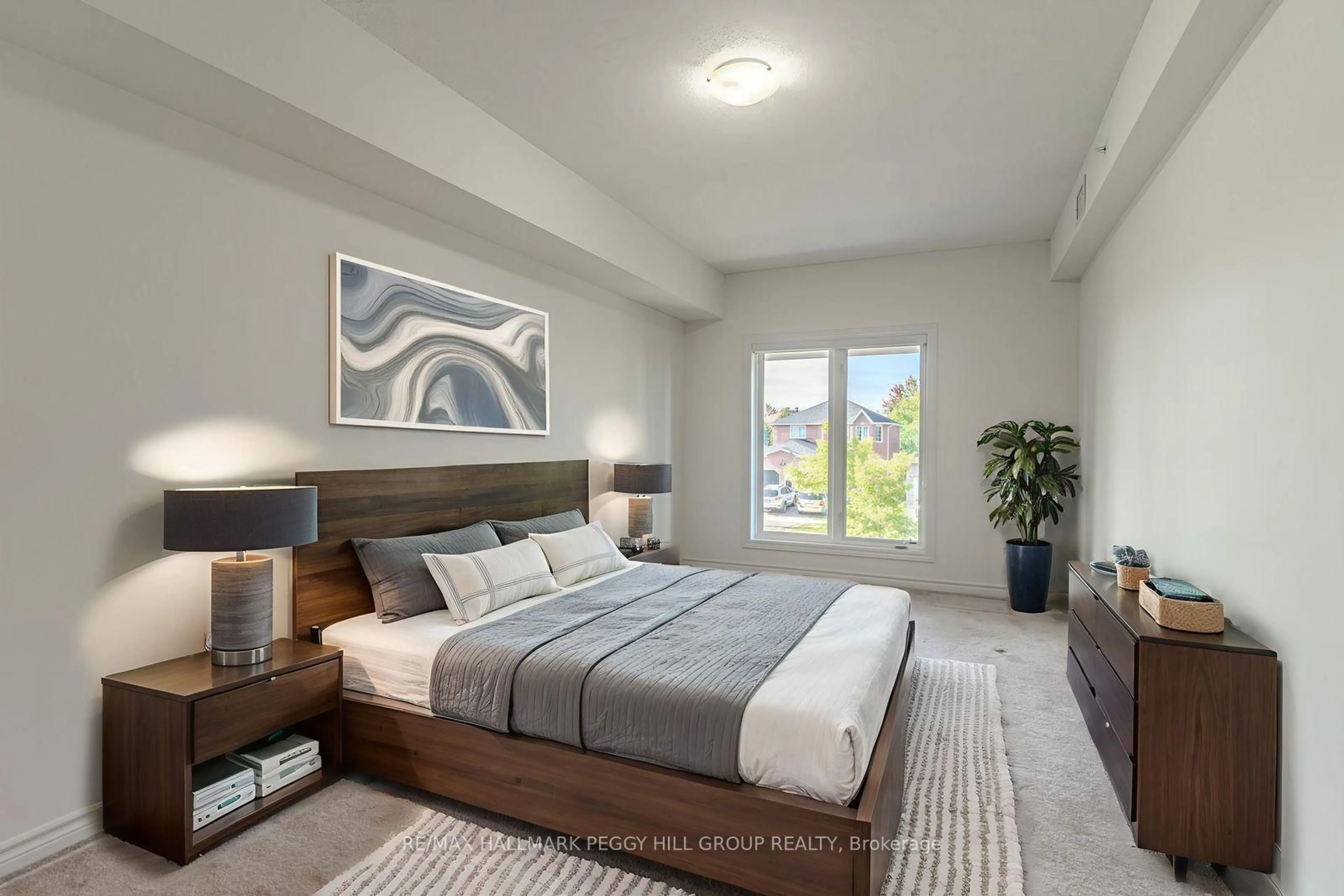 Bedroom with bed, unknown for 100 Dean Ave #110, Barrie Ontario L9J 0H1