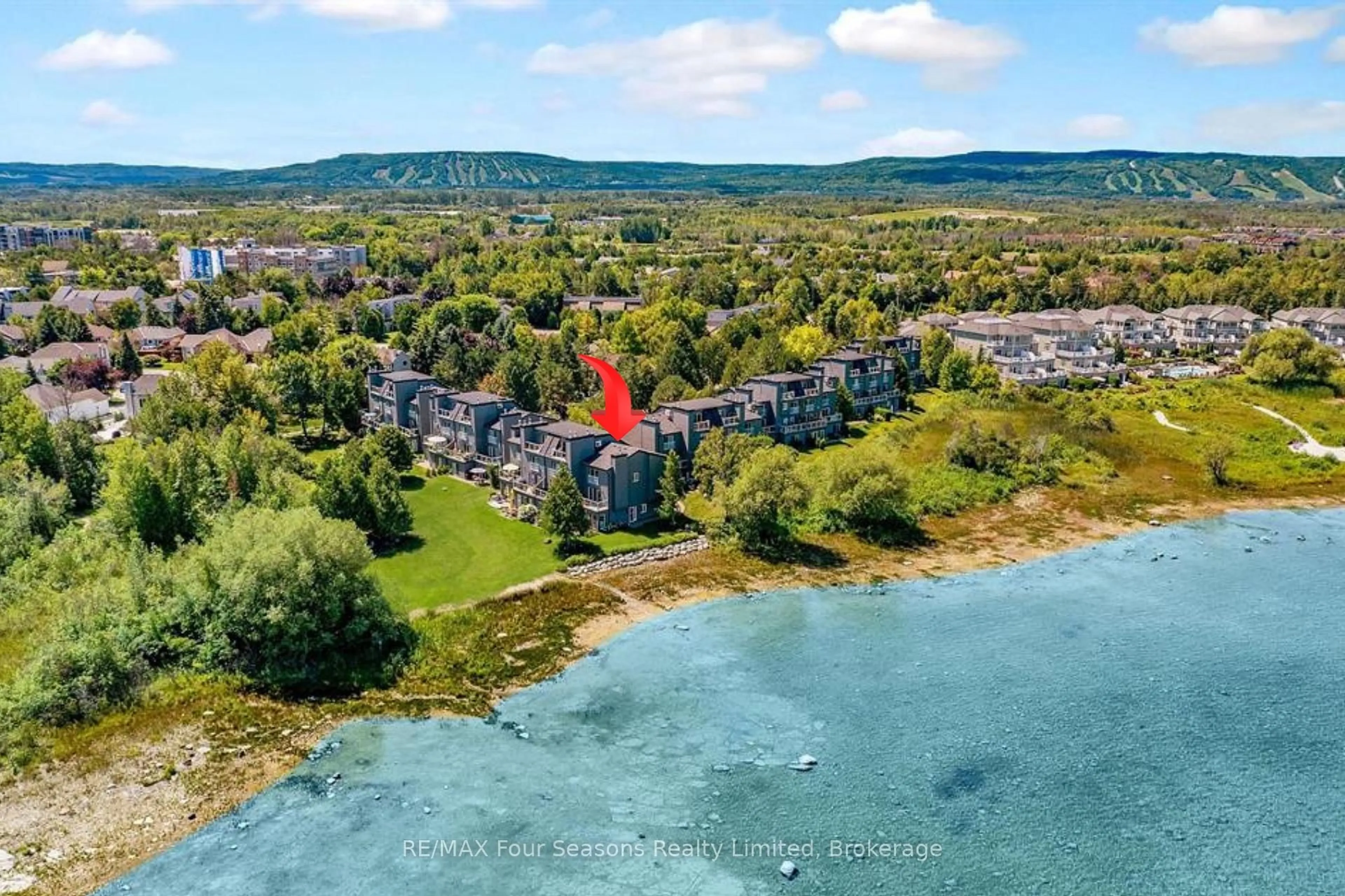 A pic from outside/outdoor area/front of a property/back of a property/a pic from drone, water/lake/river/ocean view for 44 Trott Blvd #17, Collingwood Ontario L9Y 5B7