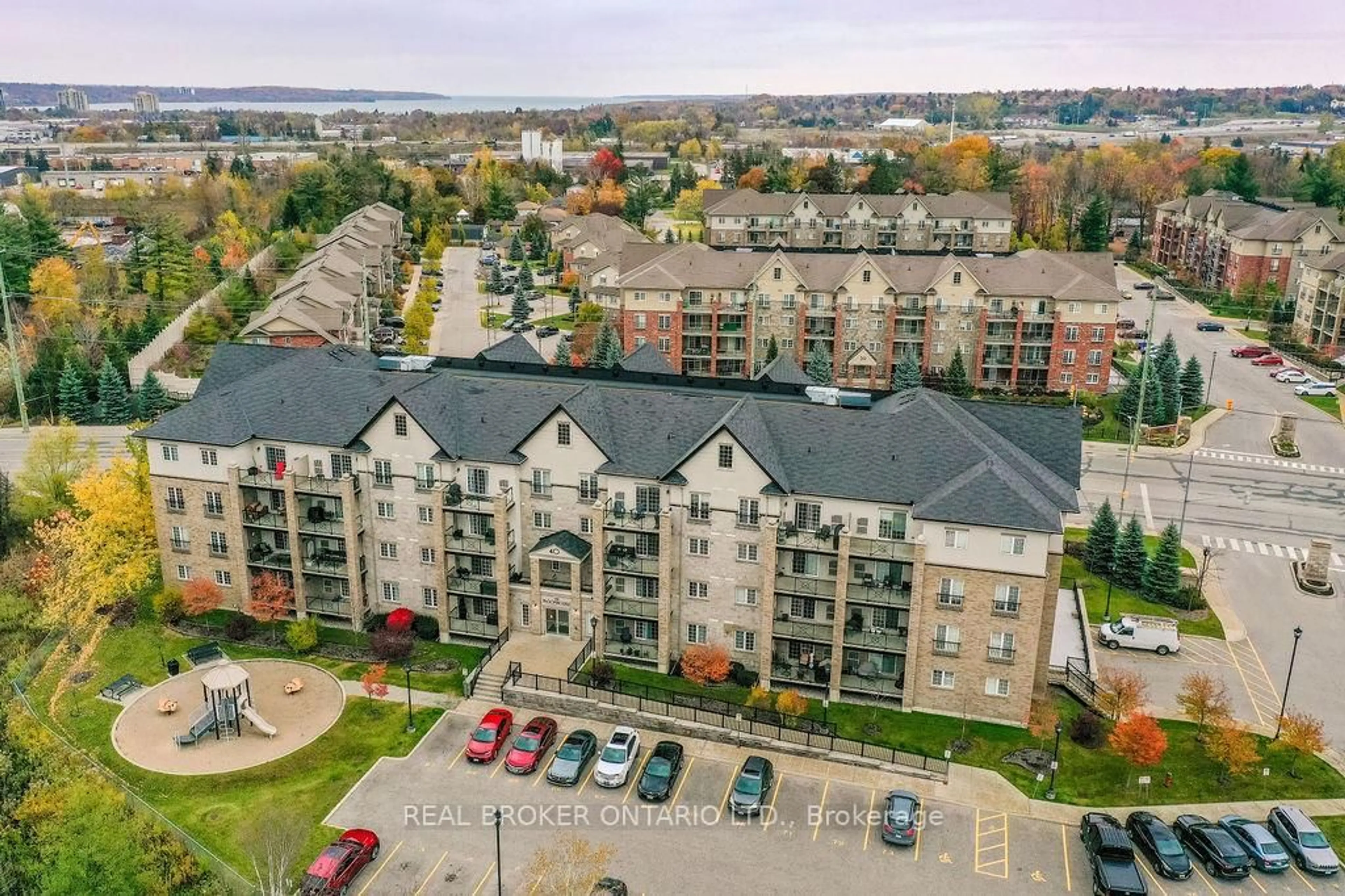 A pic from outside/outdoor area/front of a property/back of a property/a pic from drone, city buildings view from balcony for 40 Ferndale Dr #404, Barrie Ontario L4N 2L3