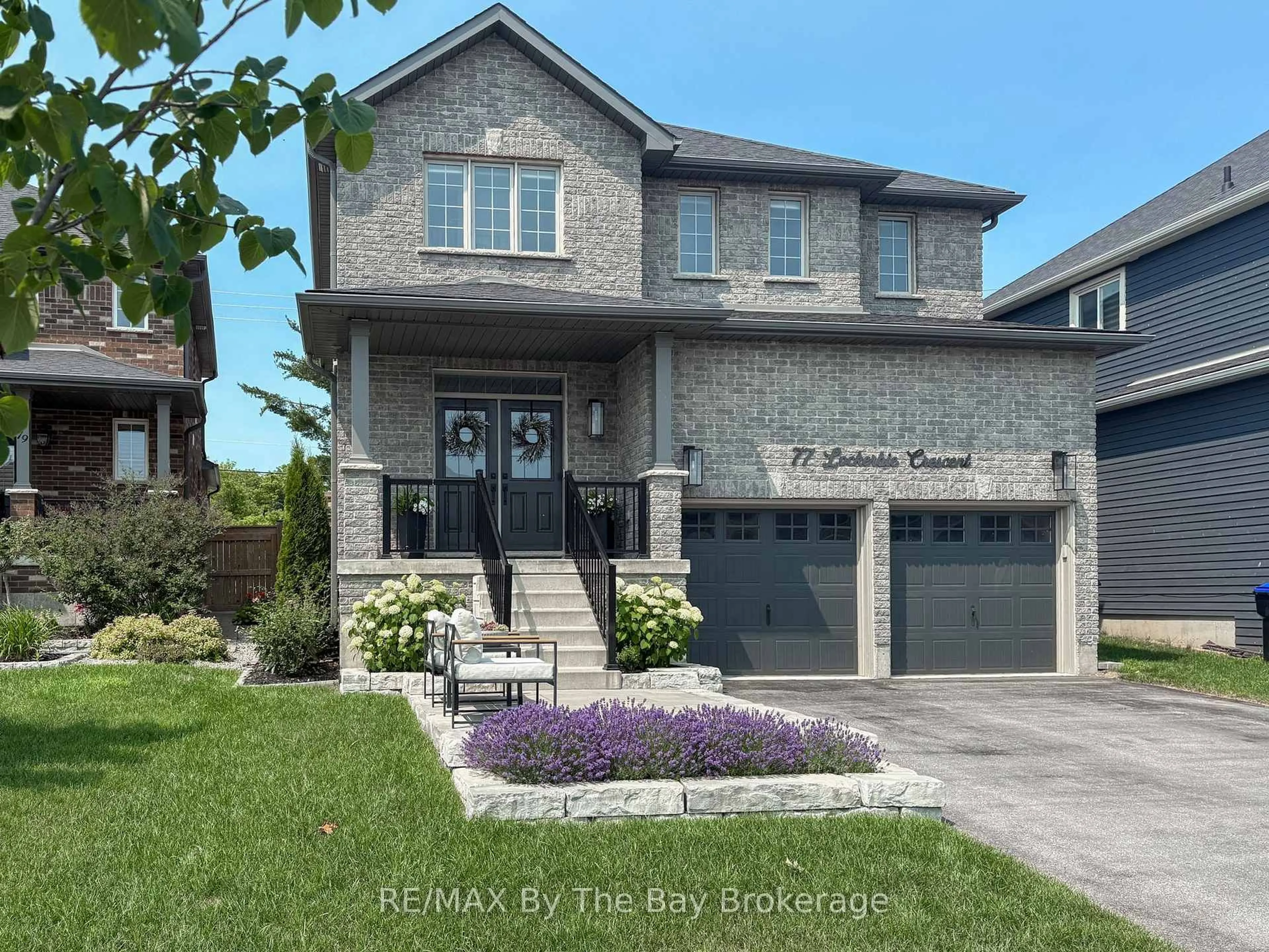 Home with brick exterior material, street for 77 Lockerbie Cres, Collingwood Ontario L9Y 0Y8