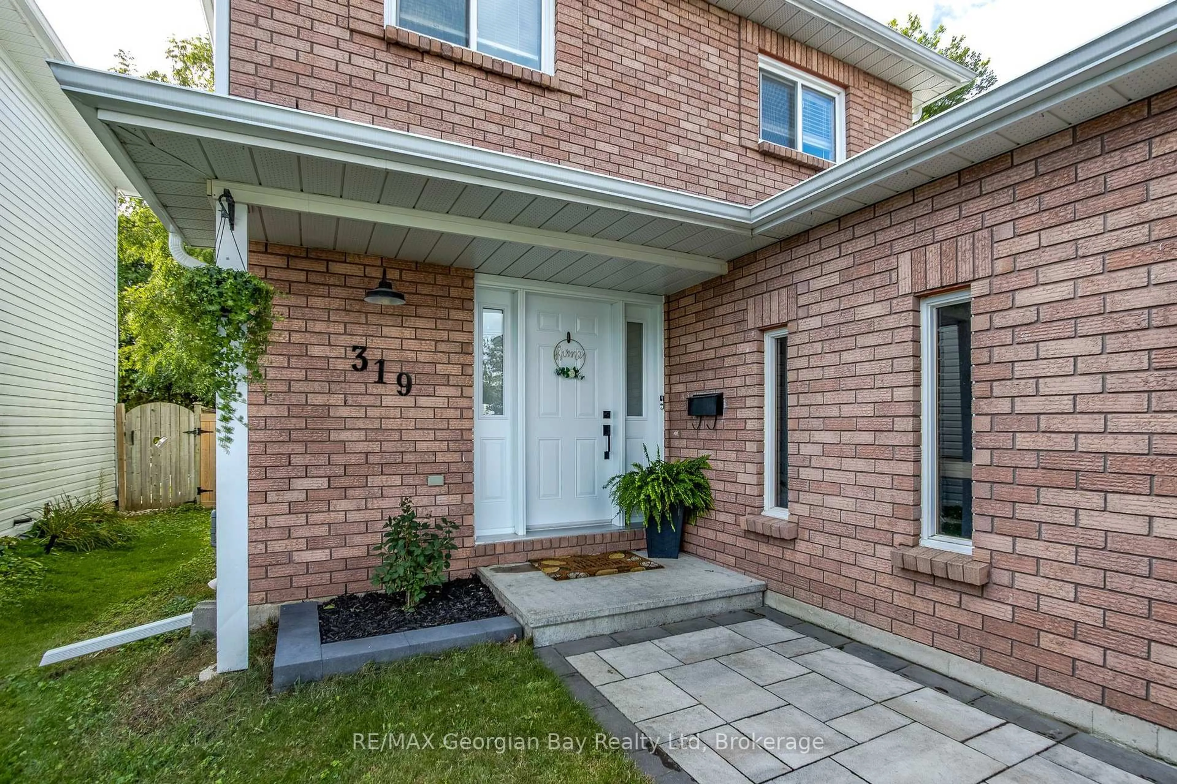 Home with brick exterior material, street for 319 Ellen St, Midland Ontario L4R 2H1