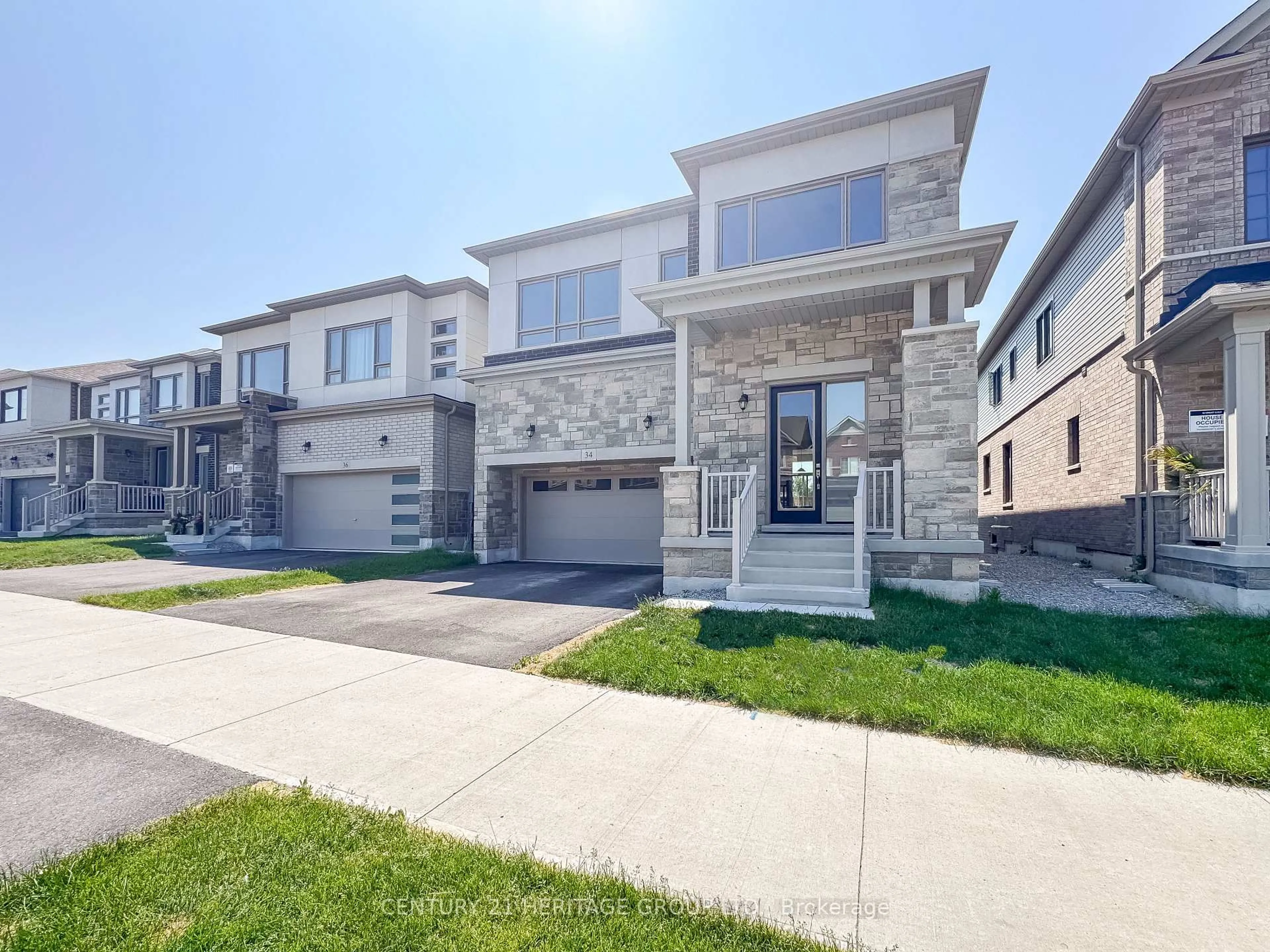 Home with brick exterior material, street for 34 Shepherd Dr, Barrie Ontario L9S 2Z4