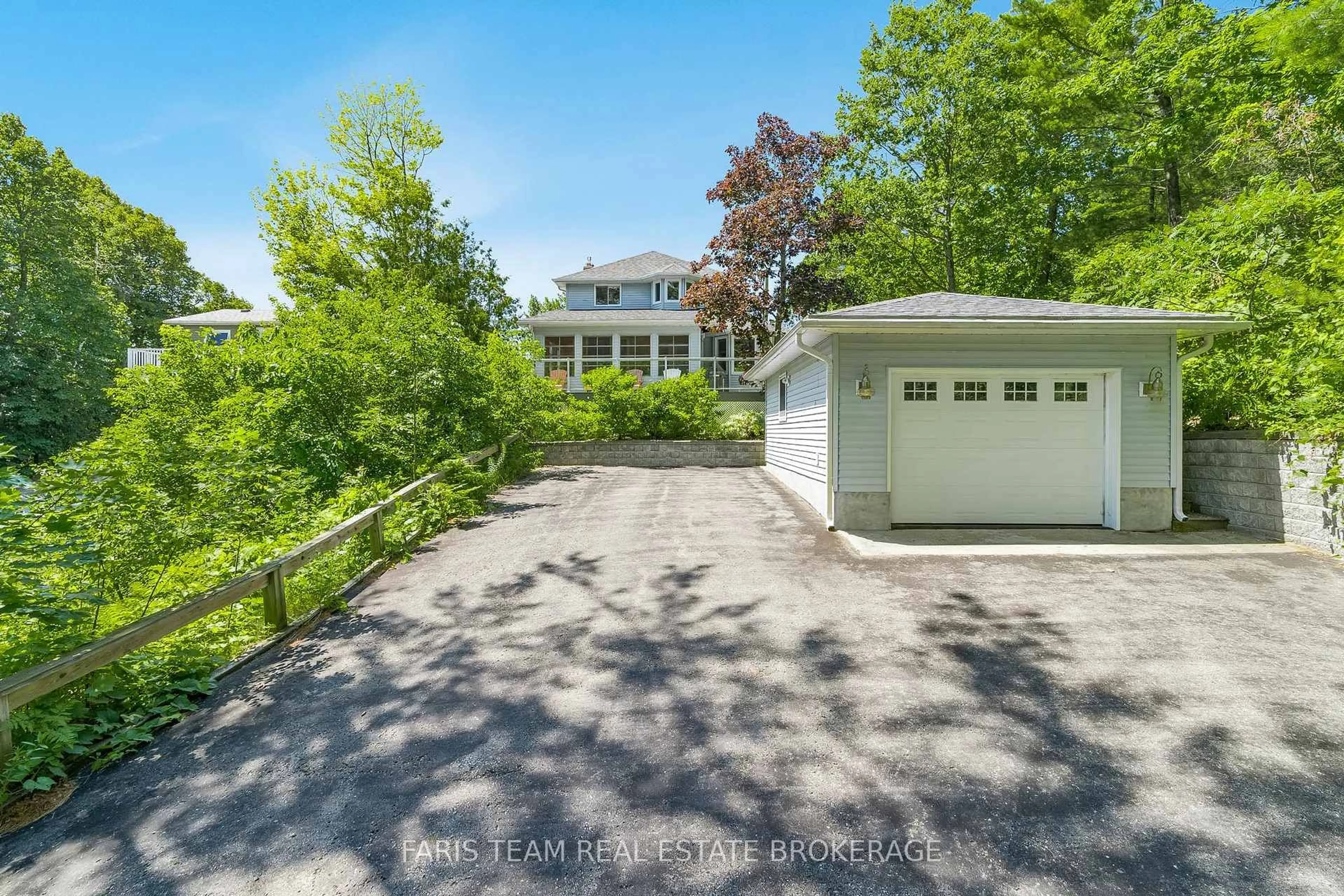 A pic from outside/outdoor area/front of a property/back of a property/a pic from drone, unknown for 8 Glen Forest Tr, Tiny Ontario L0L 2T0