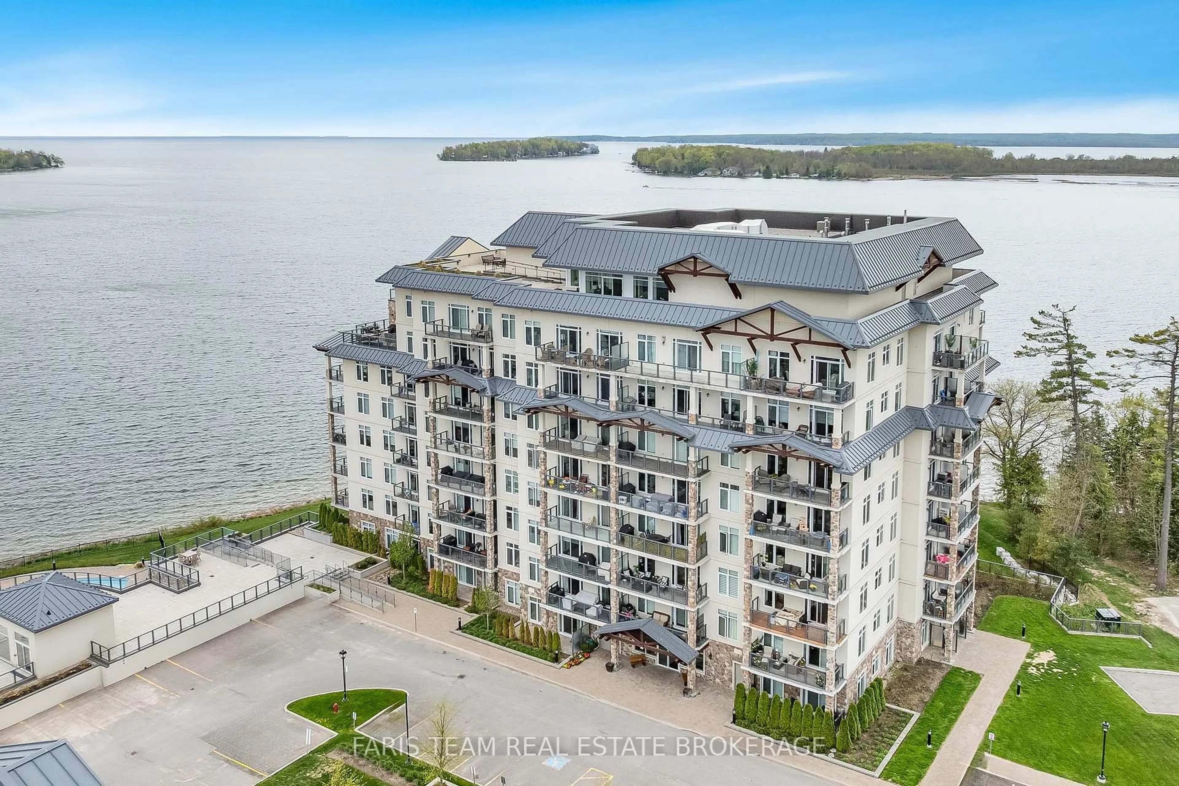 A pic from outside/outdoor area/front of a property/back of a property/a pic from drone, water/lake/river/ocean view for 90 Orchard Point Rd #703, Orillia Ontario L3V 8K4