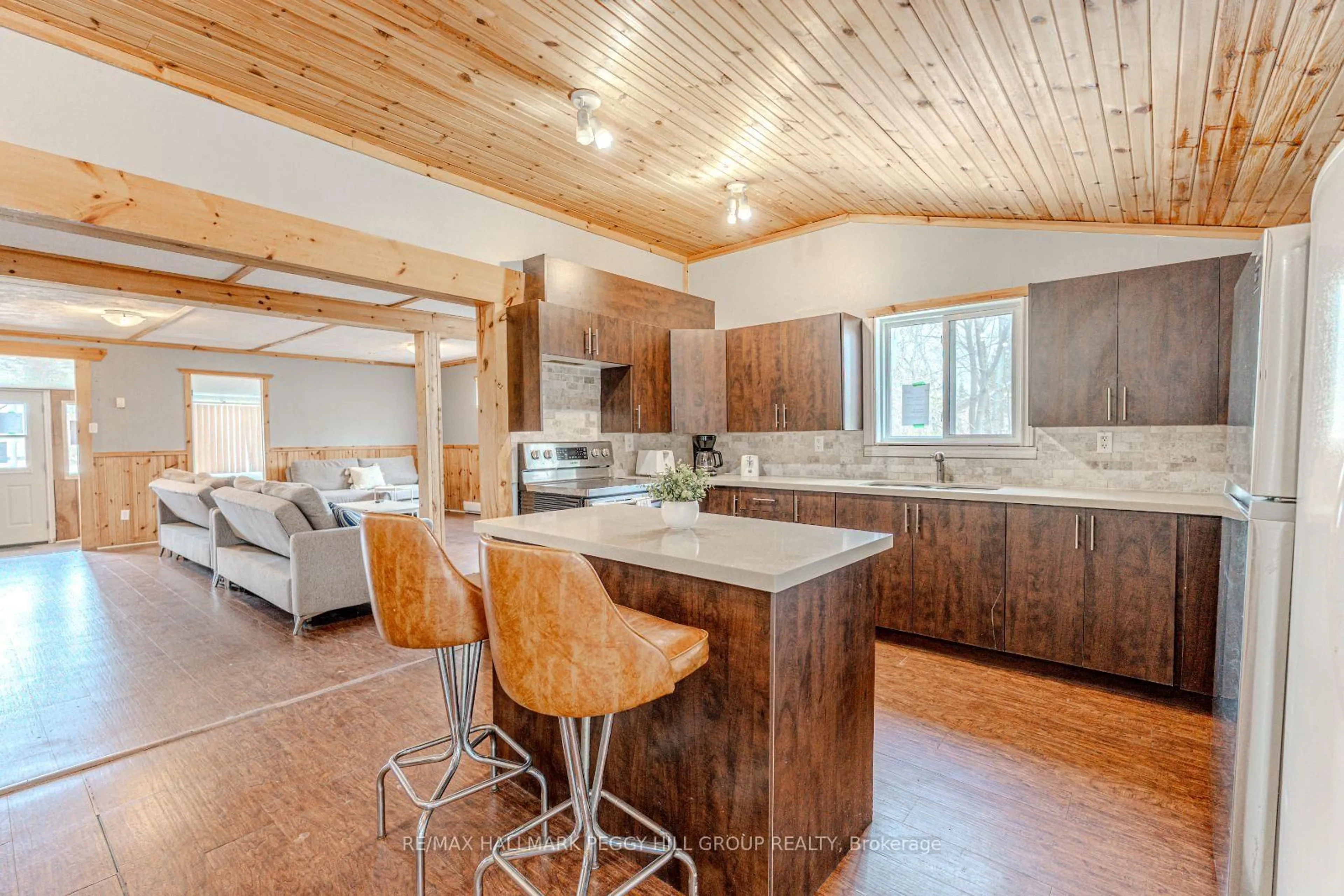 Open concept kitchen, unknown for 711 Mosley St, Wasaga Beach Ontario L9Z 1Z5
