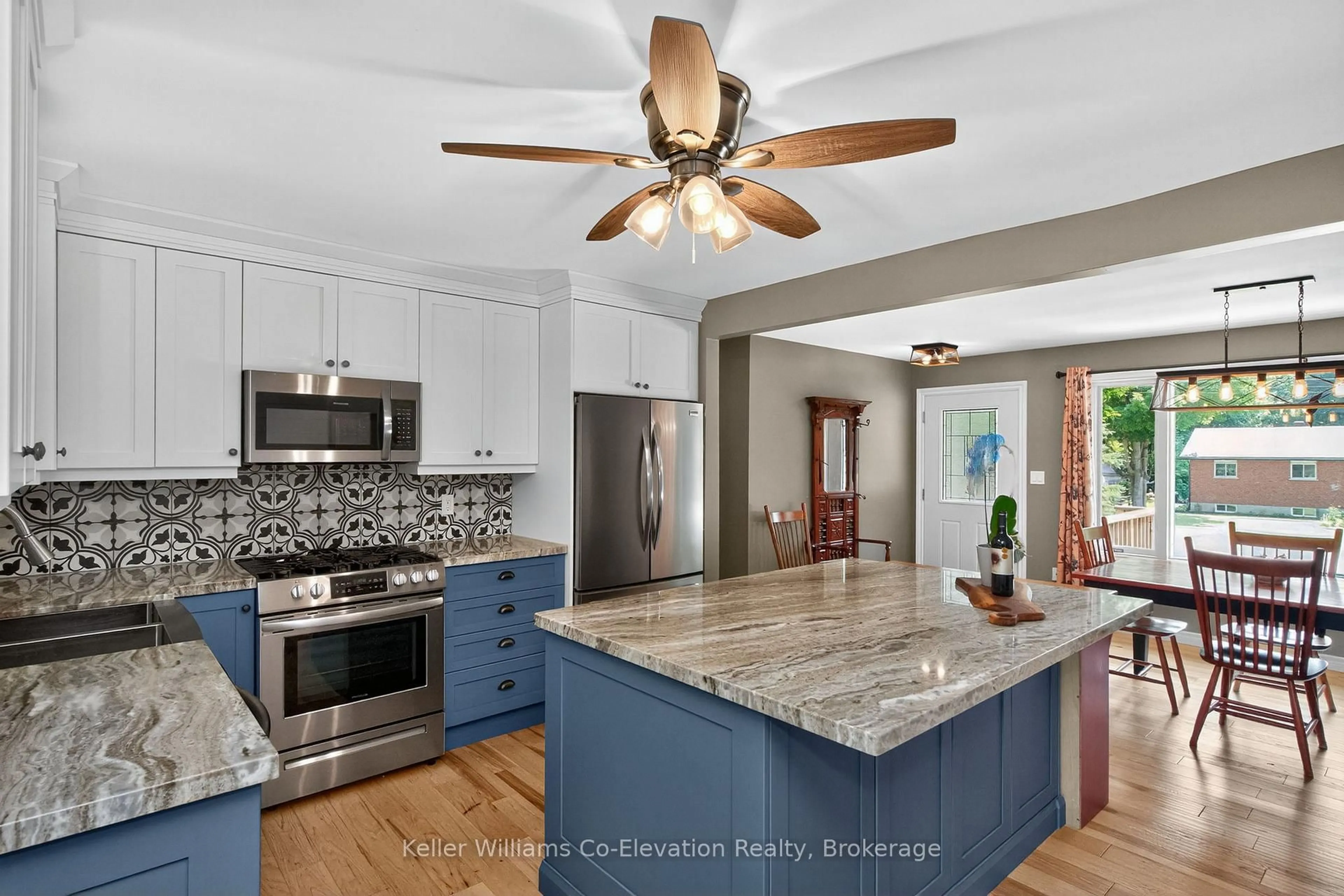 Open concept kitchen, ceramic/tile floor for 16 Mundy Ave, Tiny Ontario L9M 0B5