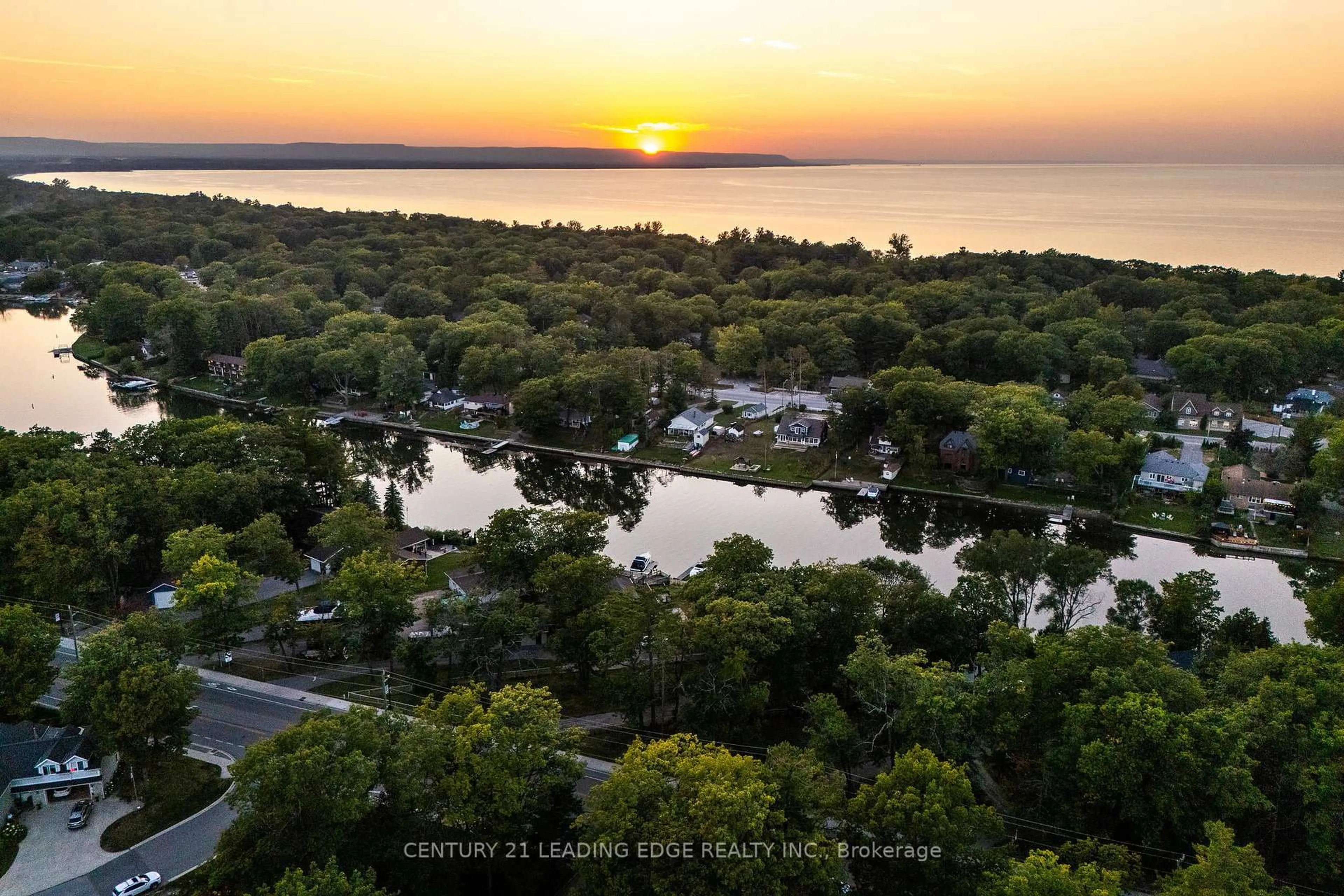 A pic from outside/outdoor area/front of a property/back of a property/a pic from drone, water/lake/river/ocean view for 1988 River Rd, Wasaga Beach Ontario L9Z 2W1
