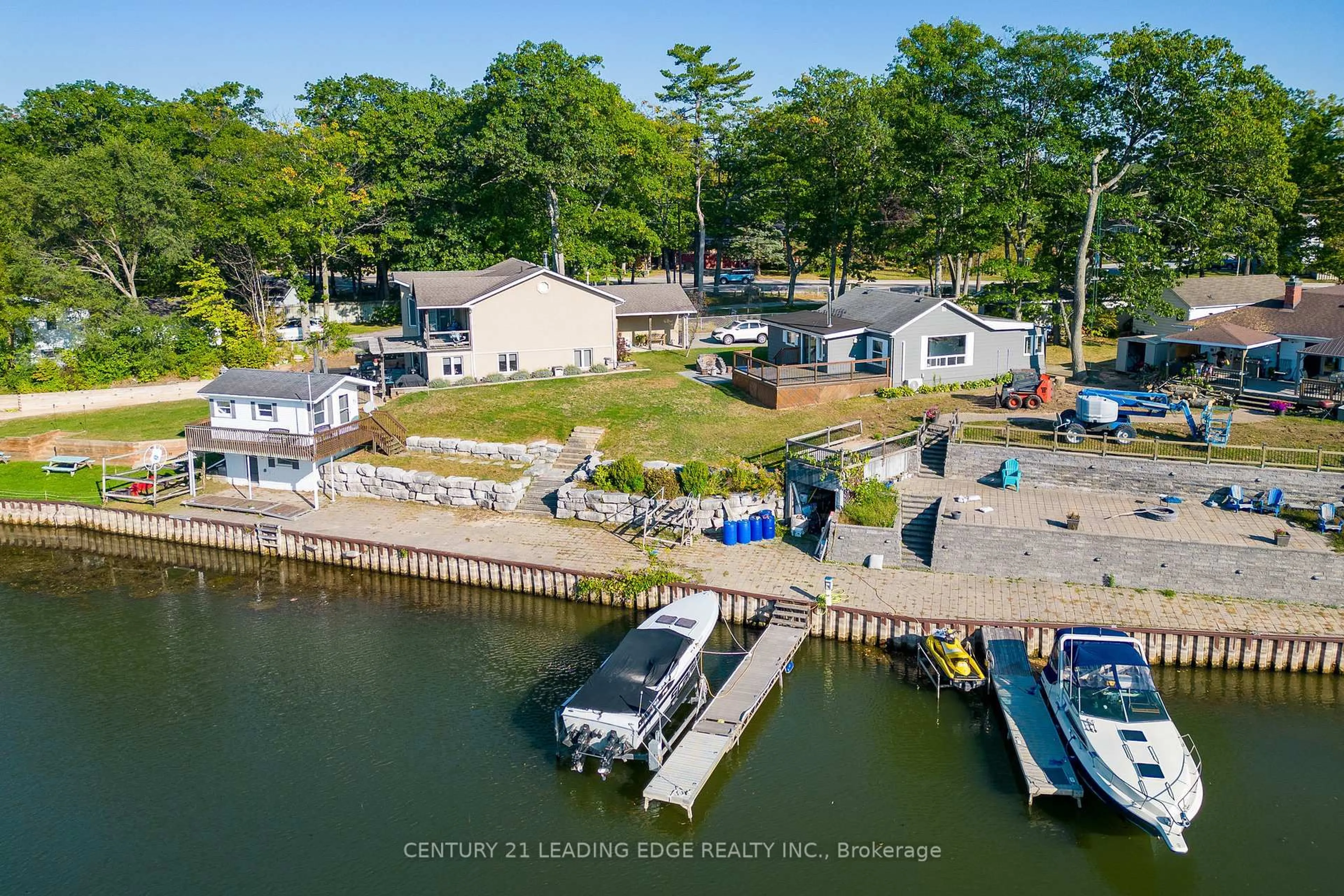 A pic from outside/outdoor area/front of a property/back of a property/a pic from drone, water/lake/river/ocean view for 1988 River Rd, Wasaga Beach Ontario L9Z 2W1