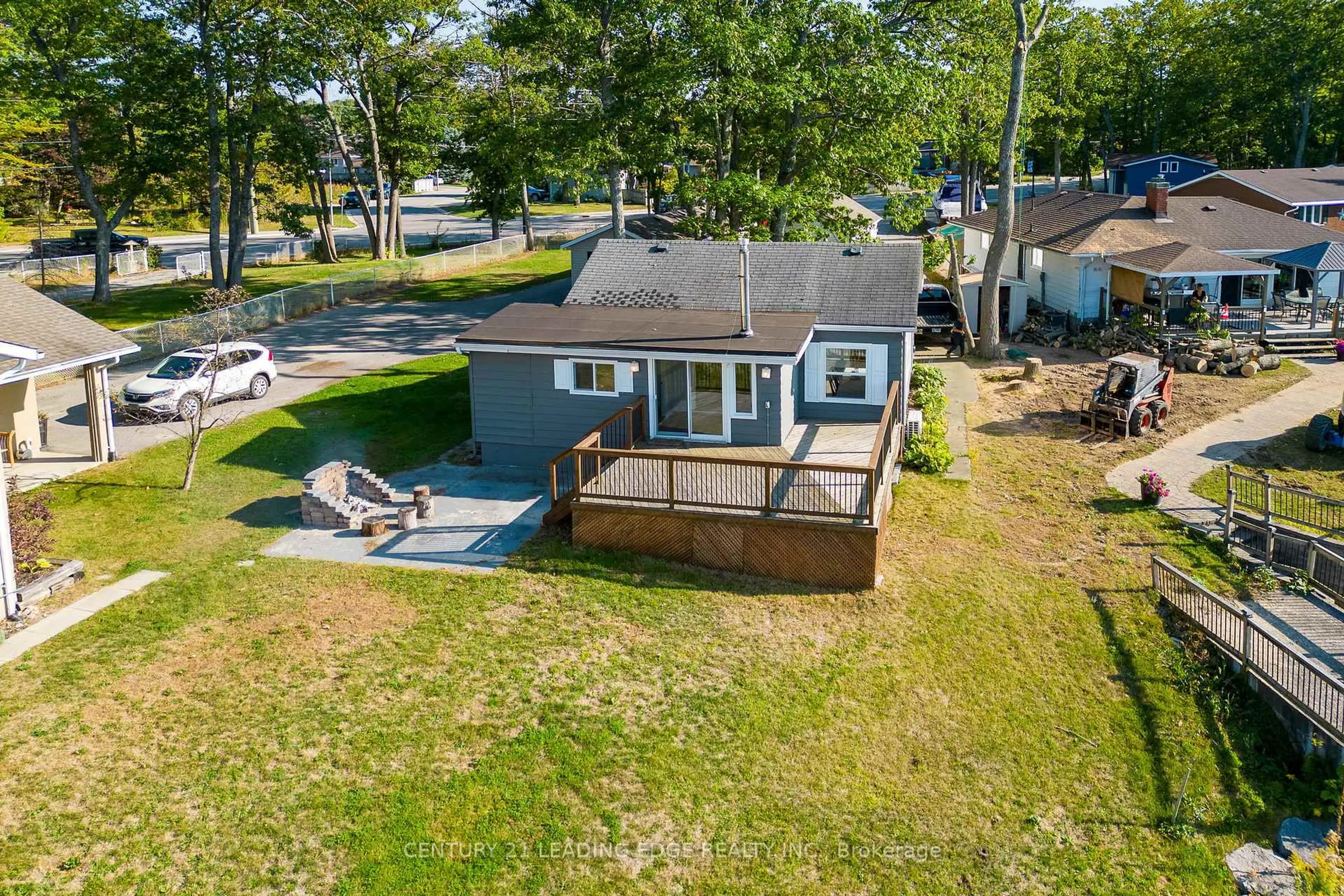 A pic from outside/outdoor area/front of a property/back of a property/a pic from drone, water/lake/river/ocean view for 1988 River Rd, Wasaga Beach Ontario L9Z 2W1