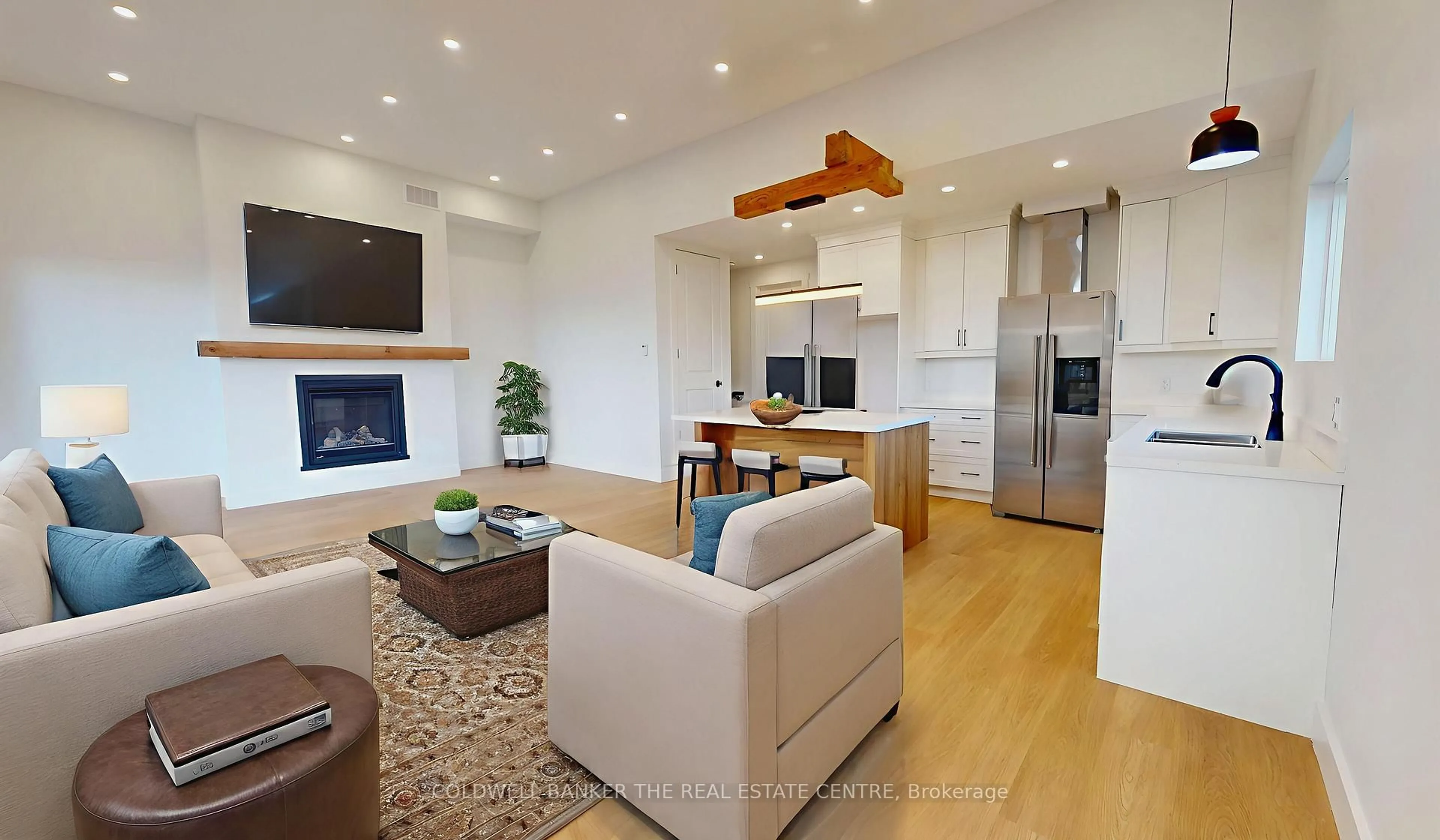 Living room with furniture, wood/laminate floor for 62 Gray St, Severn Ontario L0K 1E0