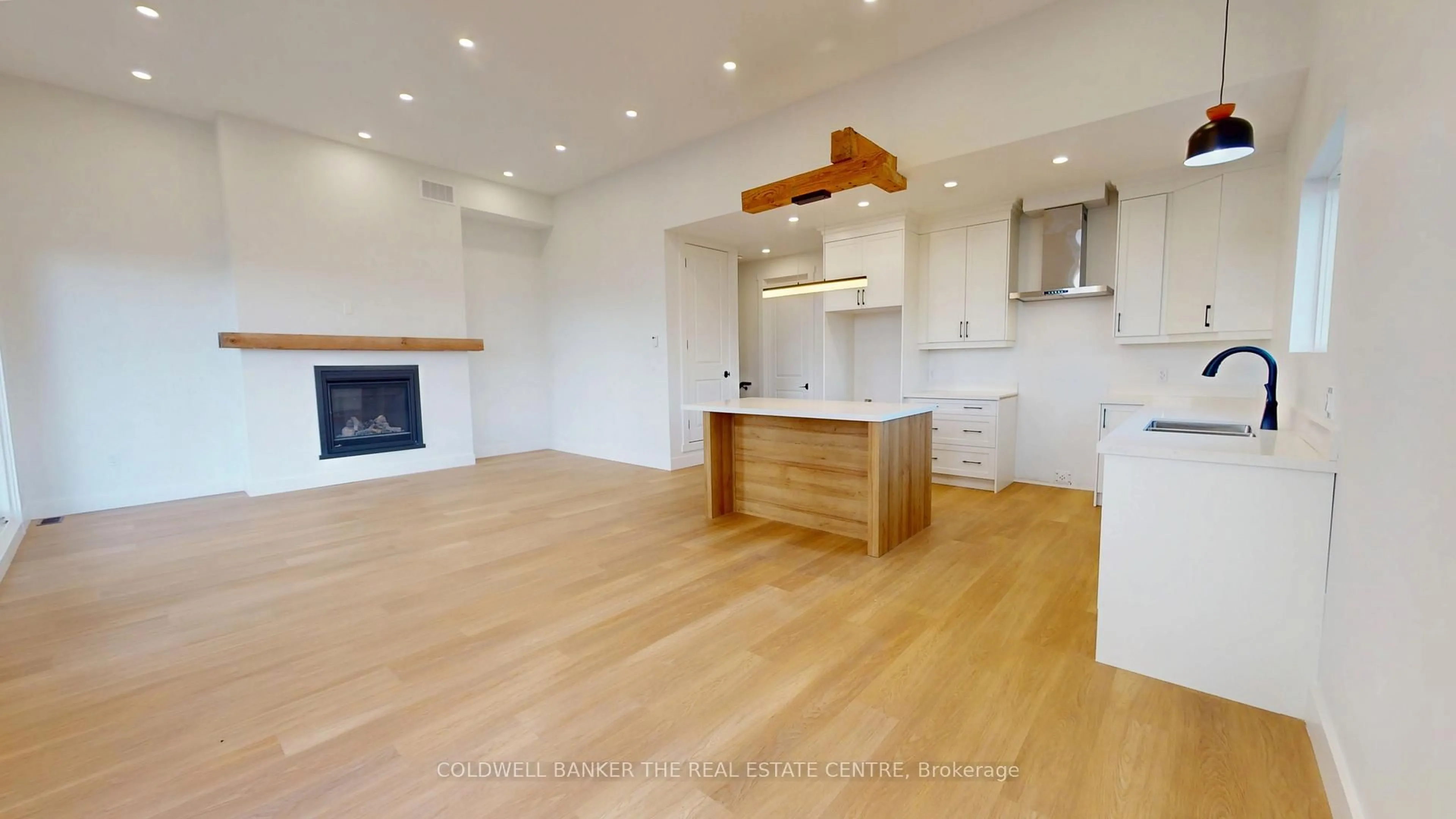 Open concept kitchen, wood/laminate floor for 62 Gray St, Severn Ontario L0K 1E0