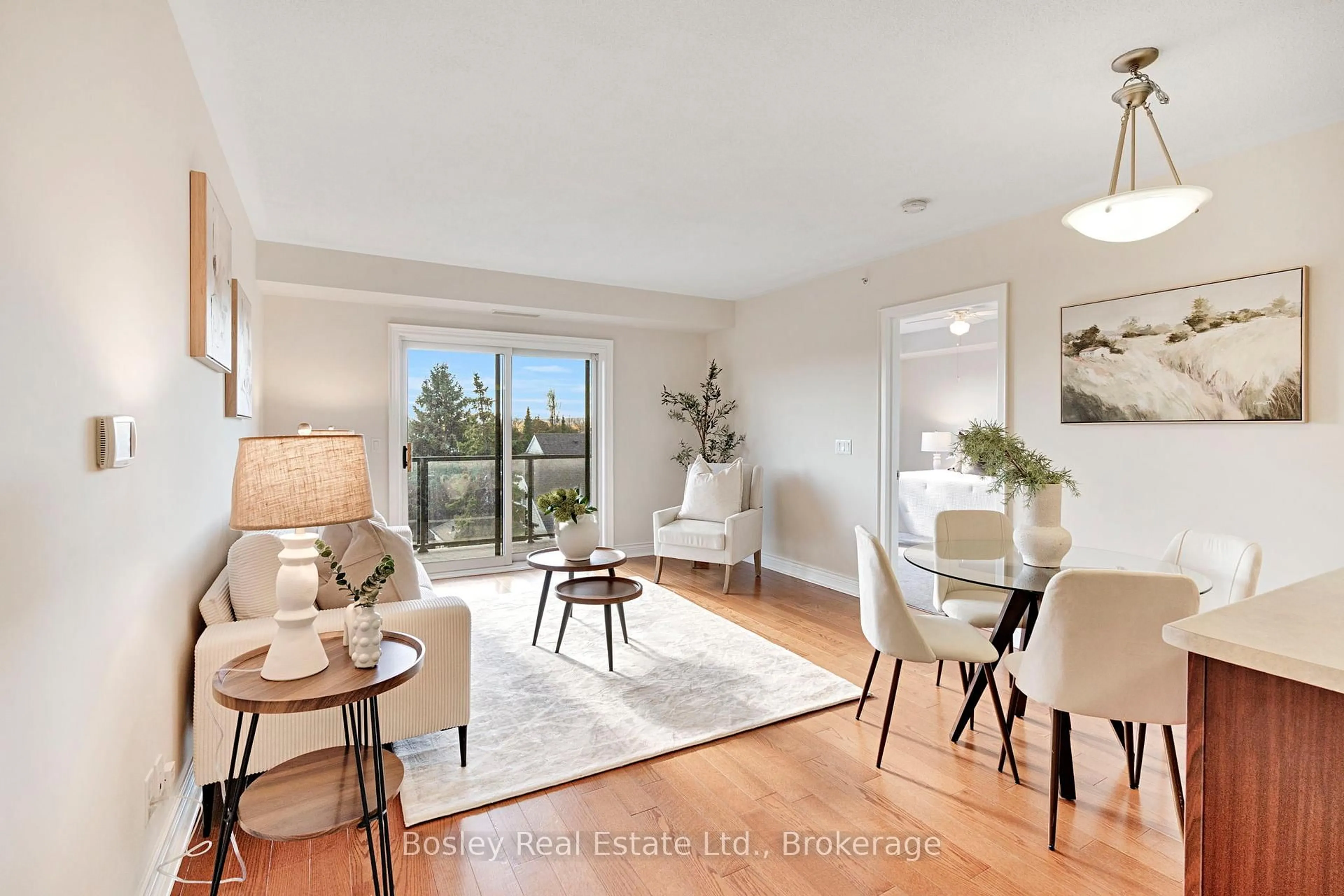 Living room with furniture, wood/laminate floor for 91 Raglan St #411, Collingwood Ontario L9Y 3B3