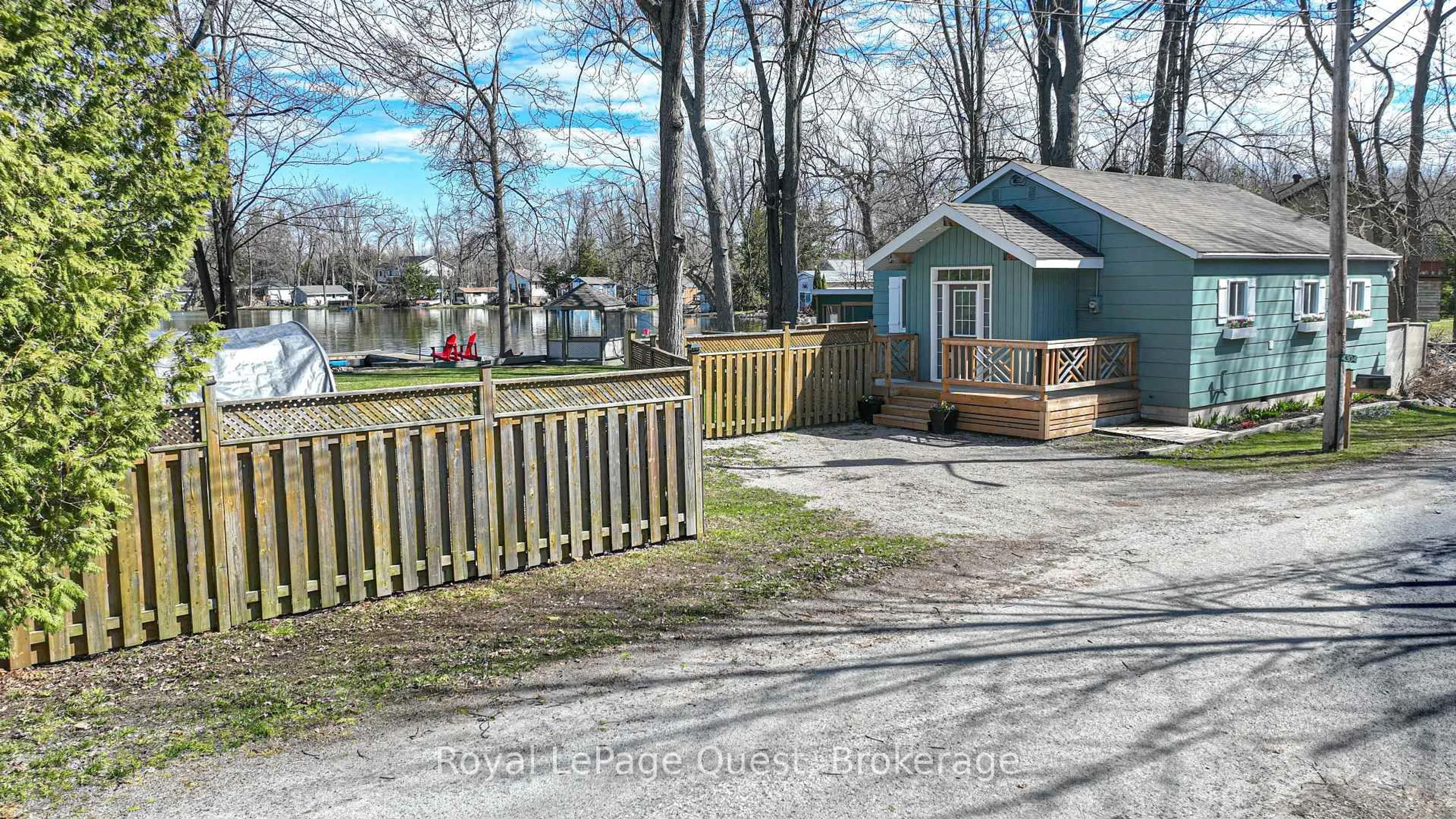 A pic from outside/outdoor area/front of a property/back of a property/a pic from drone, street for 4304 Plum Point Rd, Ramara Ontario L3V 0P8