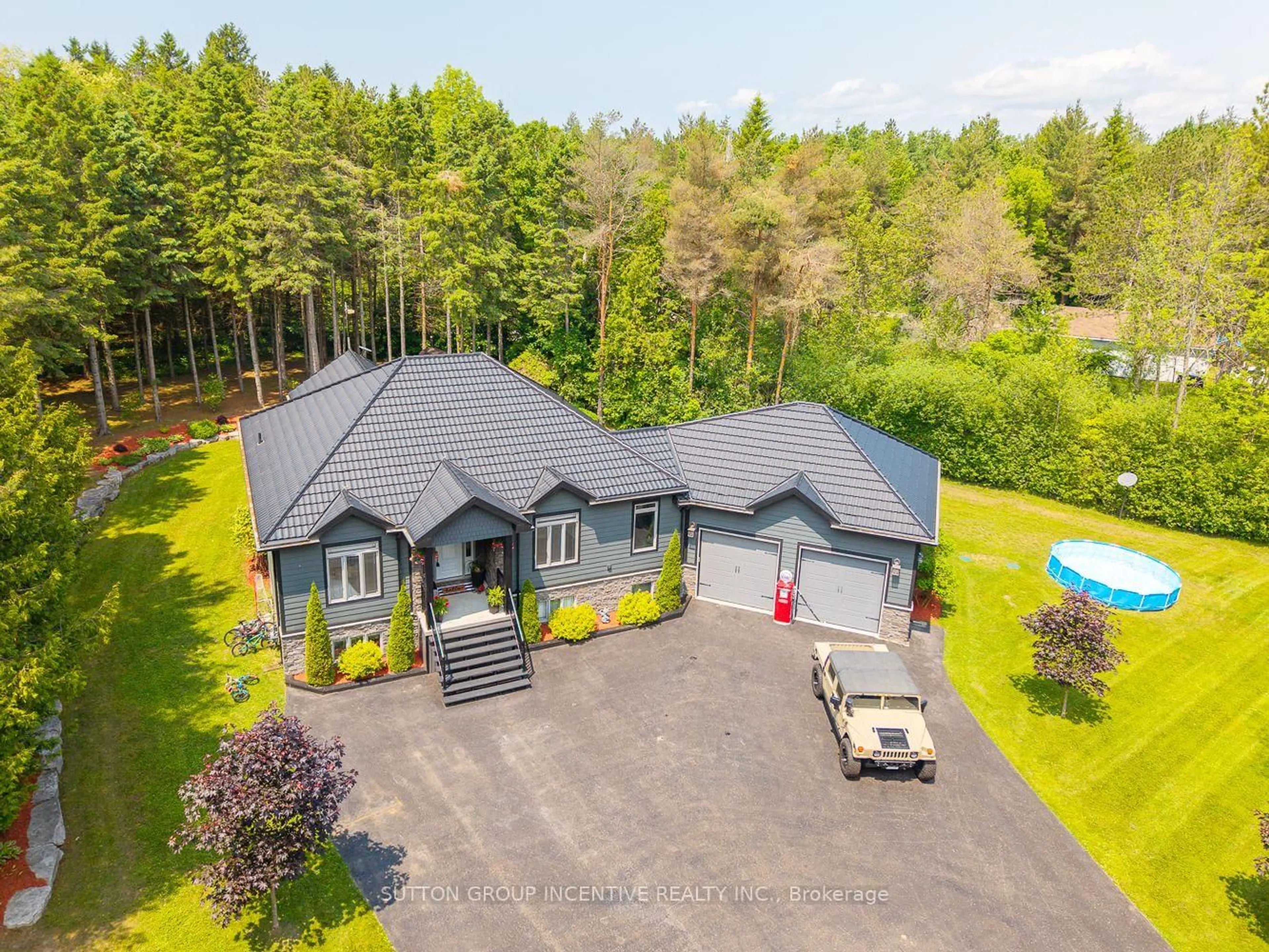 A pic from outside/outdoor area/front of a property/back of a property/a pic from drone, unknown for 7070 93 Highway, Tiny Ontario L0K 2E0