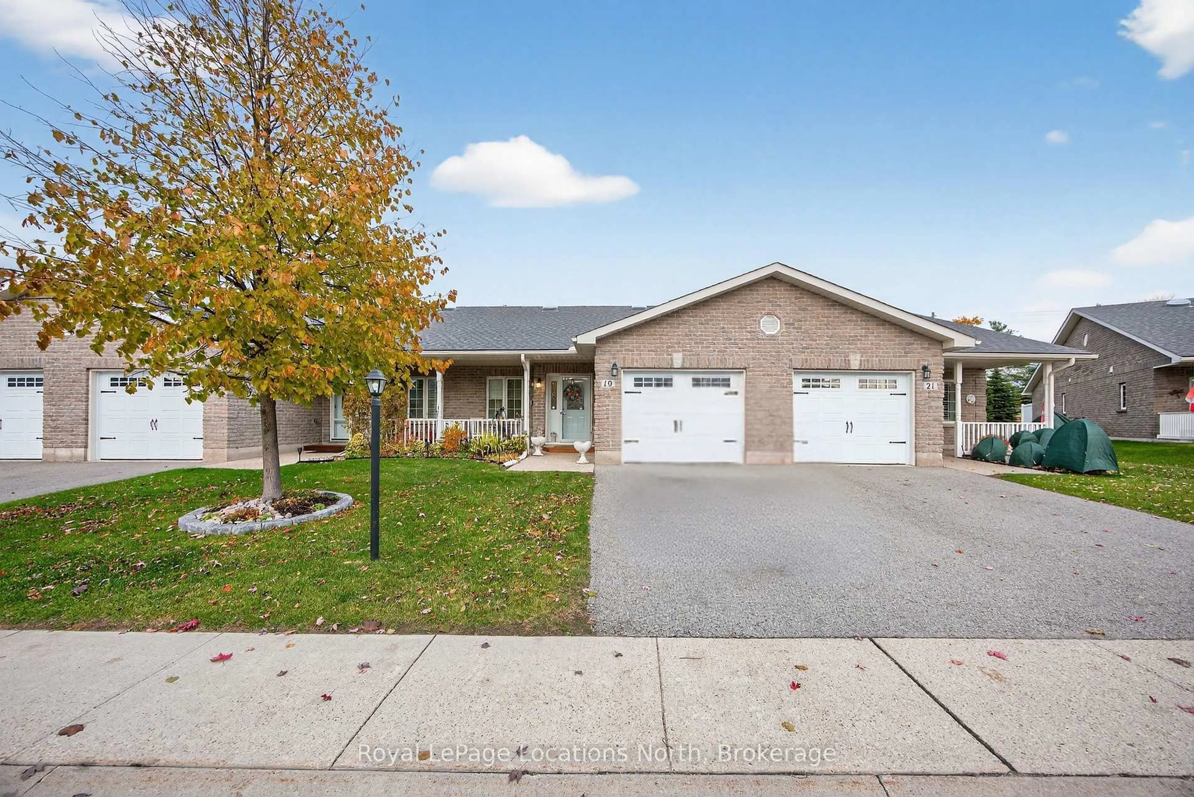 Home with brick exterior material, street for 19 Chestnut Lane, Wasaga Beach Ontario L9Z 0G4