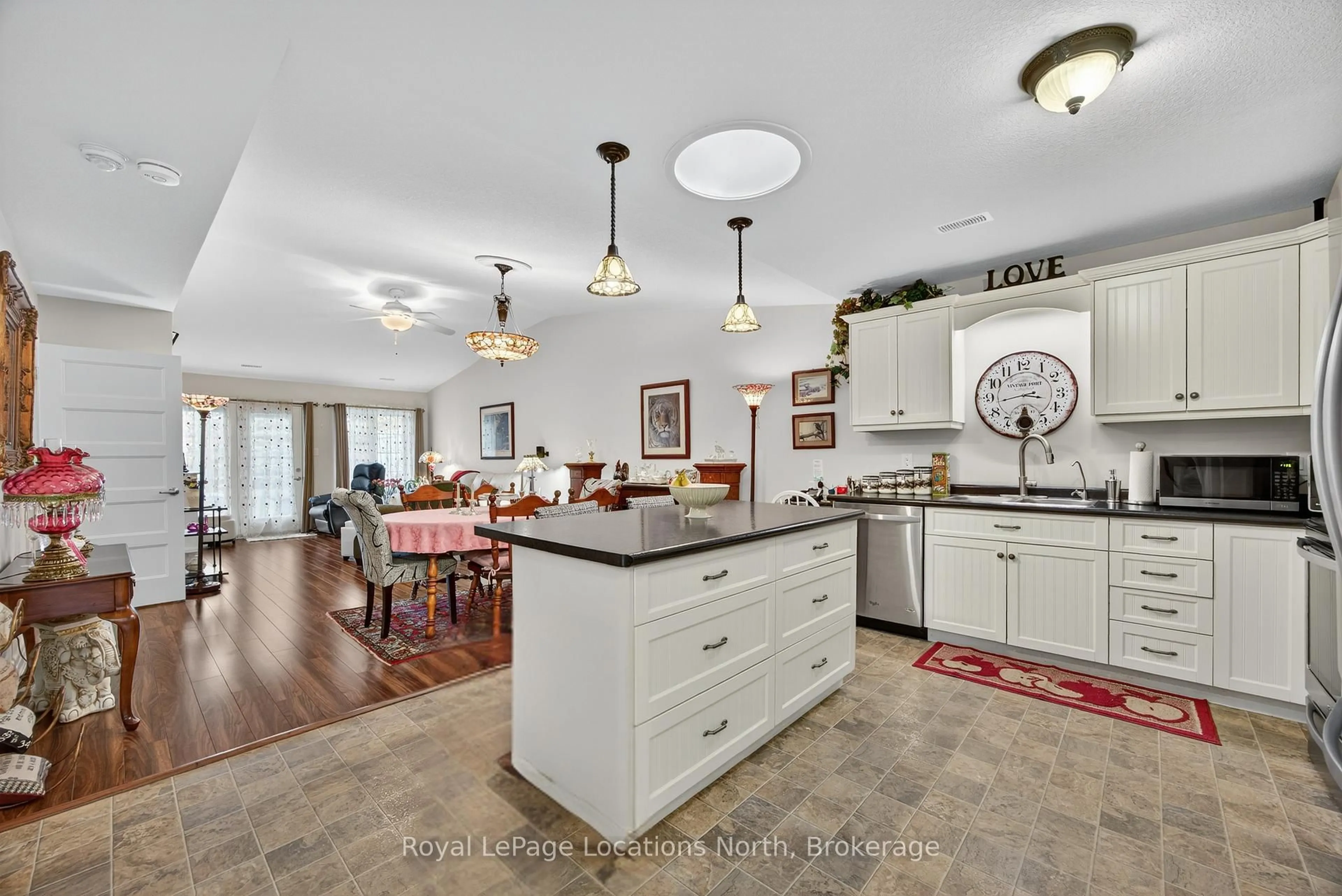 Open concept kitchen, ceramic/tile floor for 19 Chestnut Lane, Wasaga Beach Ontario L9Z 0G4