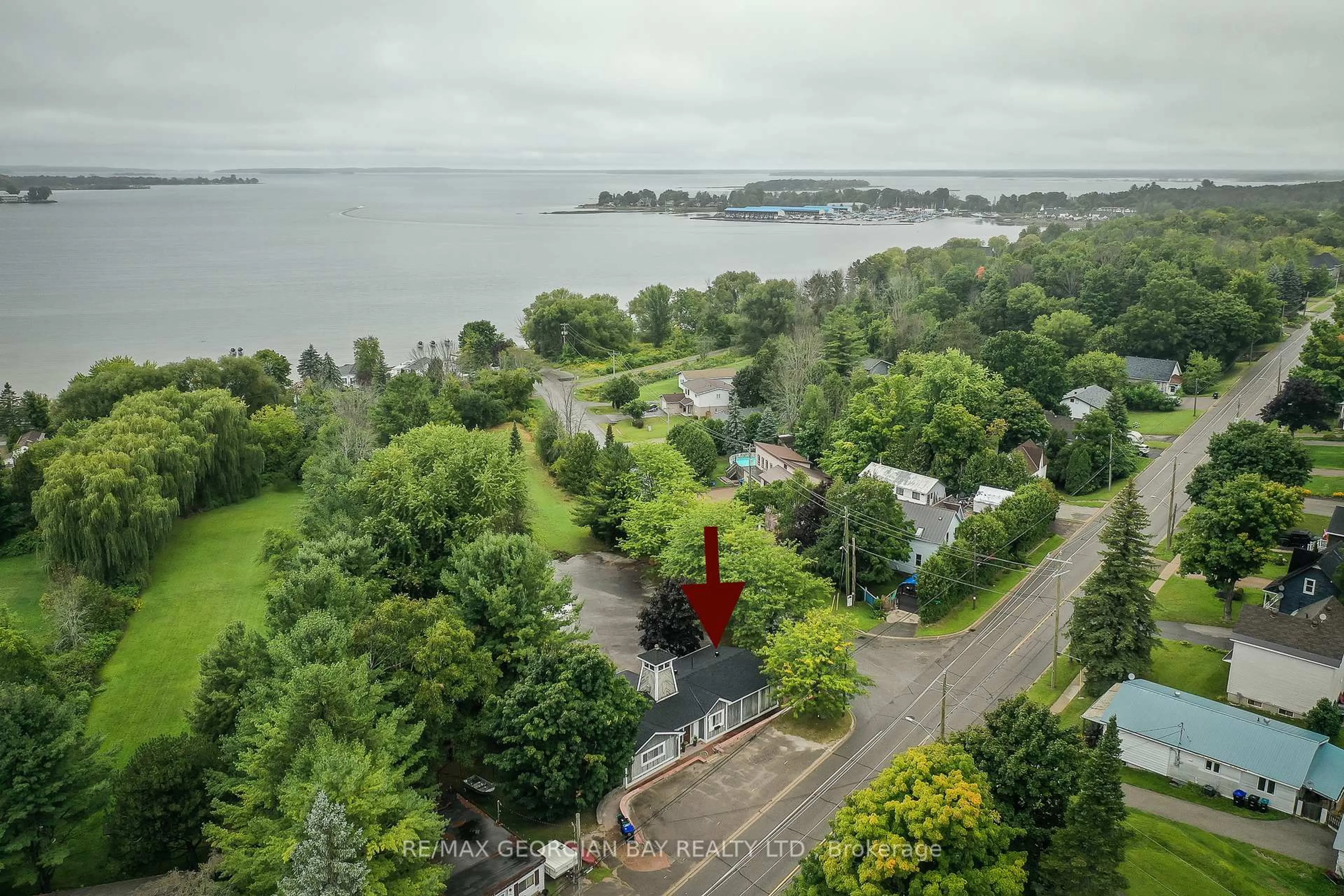 A pic from outside/outdoor area/front of a property/back of a property/a pic from drone, water/lake/river/ocean view for 392 William St, Tay Ontario L0K 2A0
