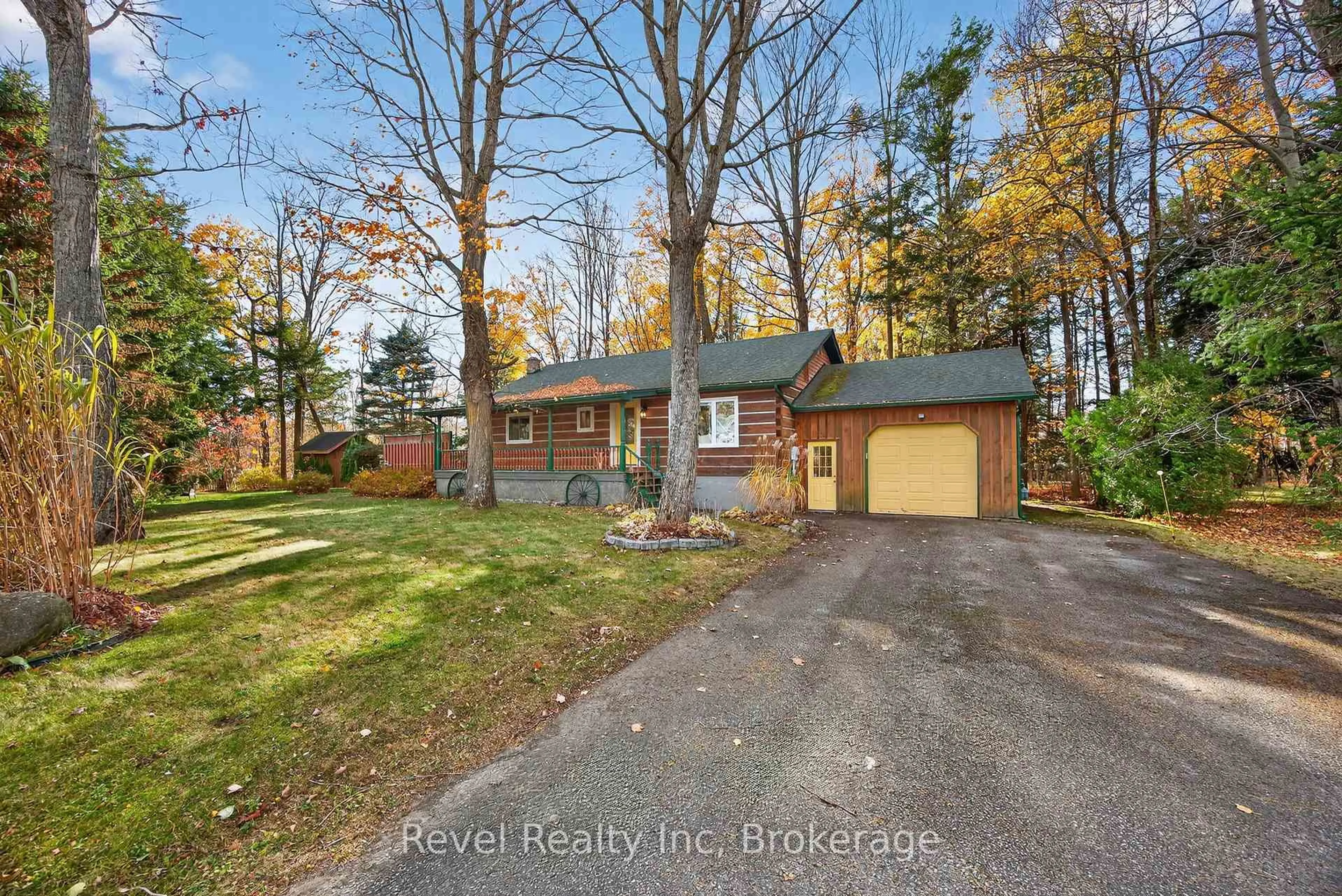 A pic from outside/outdoor area/front of a property/back of a property/a pic from drone, water/lake/river/ocean view for 144 Trout Lane, Tiny Ontario L9M 0J1