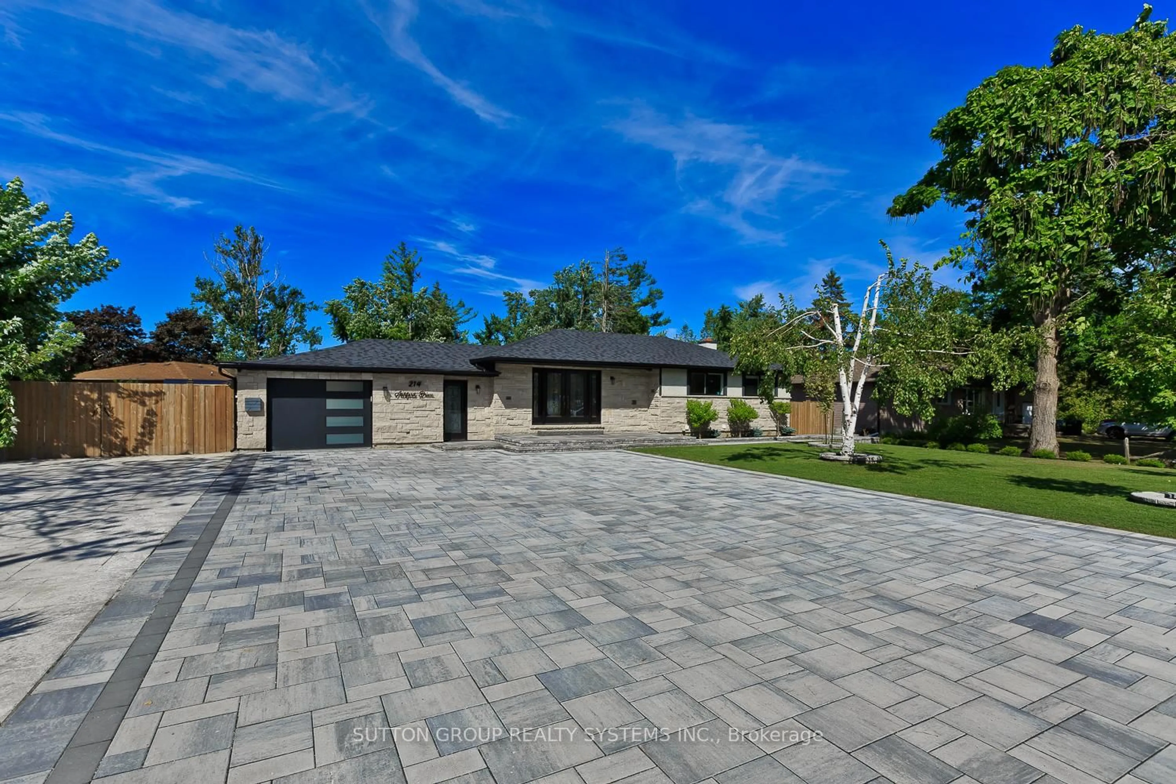 Home with brick exterior material, street for 214 ASHFORD Dr, Barrie Ontario L4N 4H3