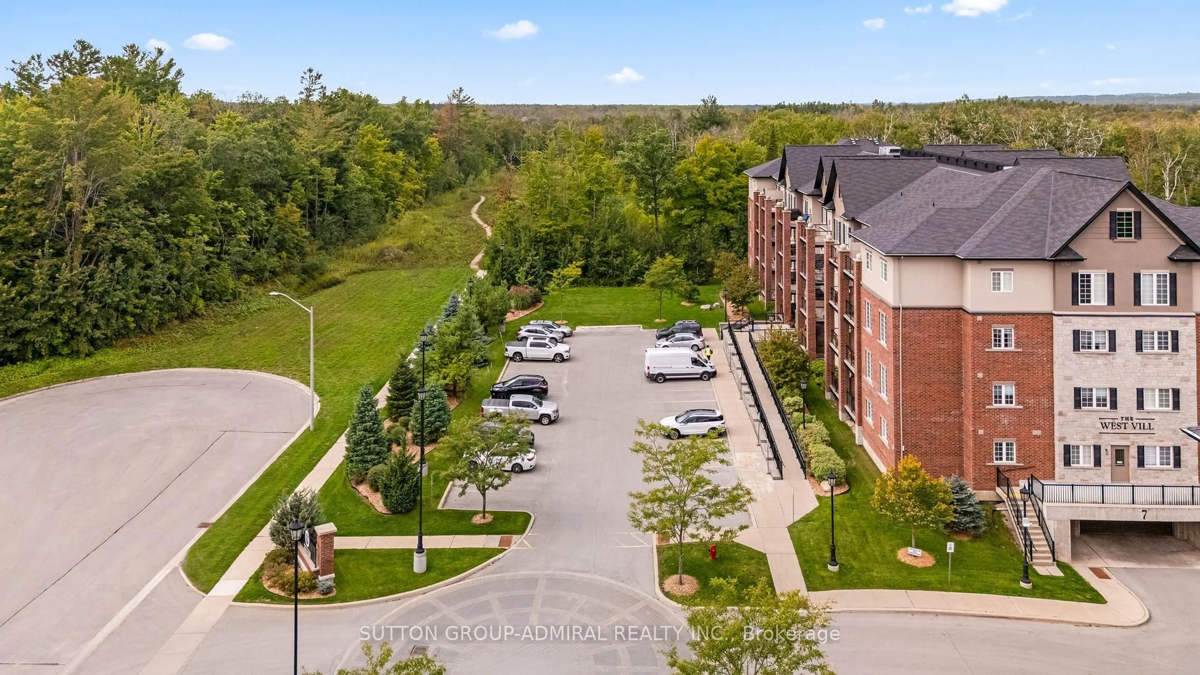 A pic from outside/outdoor area/front of a property/back of a property/a pic from drone, unknown for 7 Greenwich St #303, Barrie Ontario L4N 7Y8