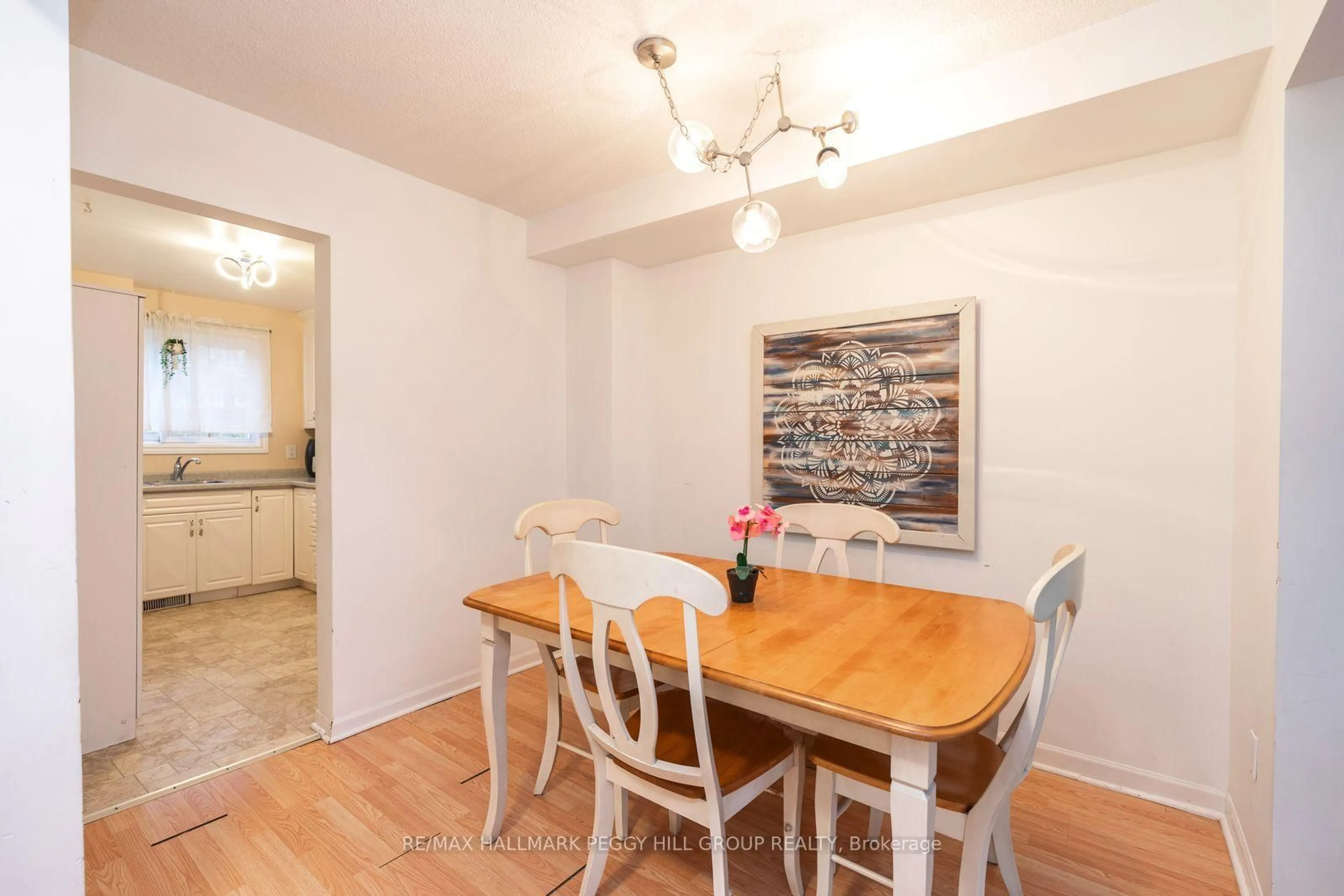 Dining room, wood/laminate floor for 29 Chaucer Cres, Barrie Ontario L4N 4T8