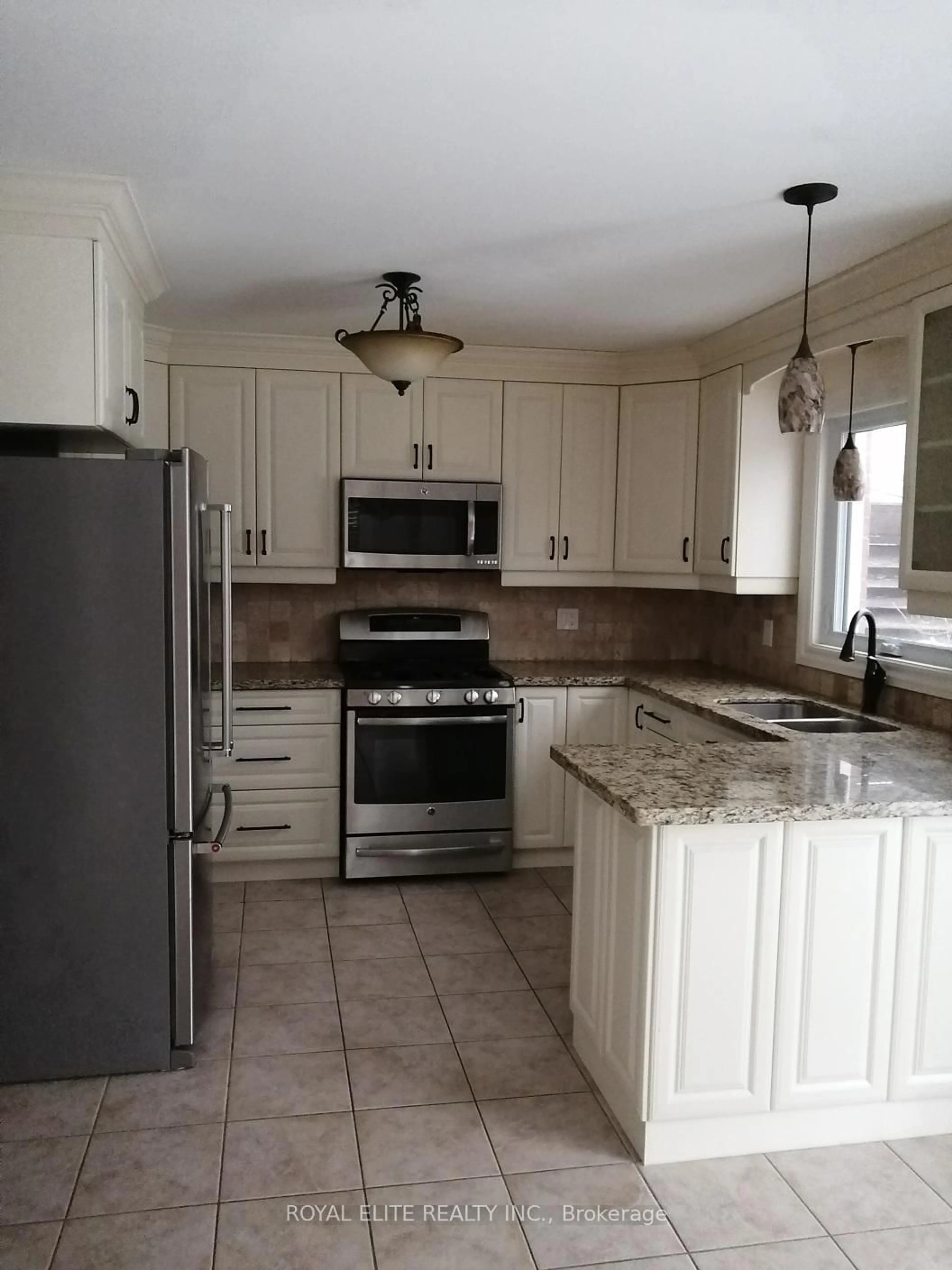 Open concept kitchen, ceramic/tile floor for 311 Stanley St, Barrie Ontario L4M 6X6