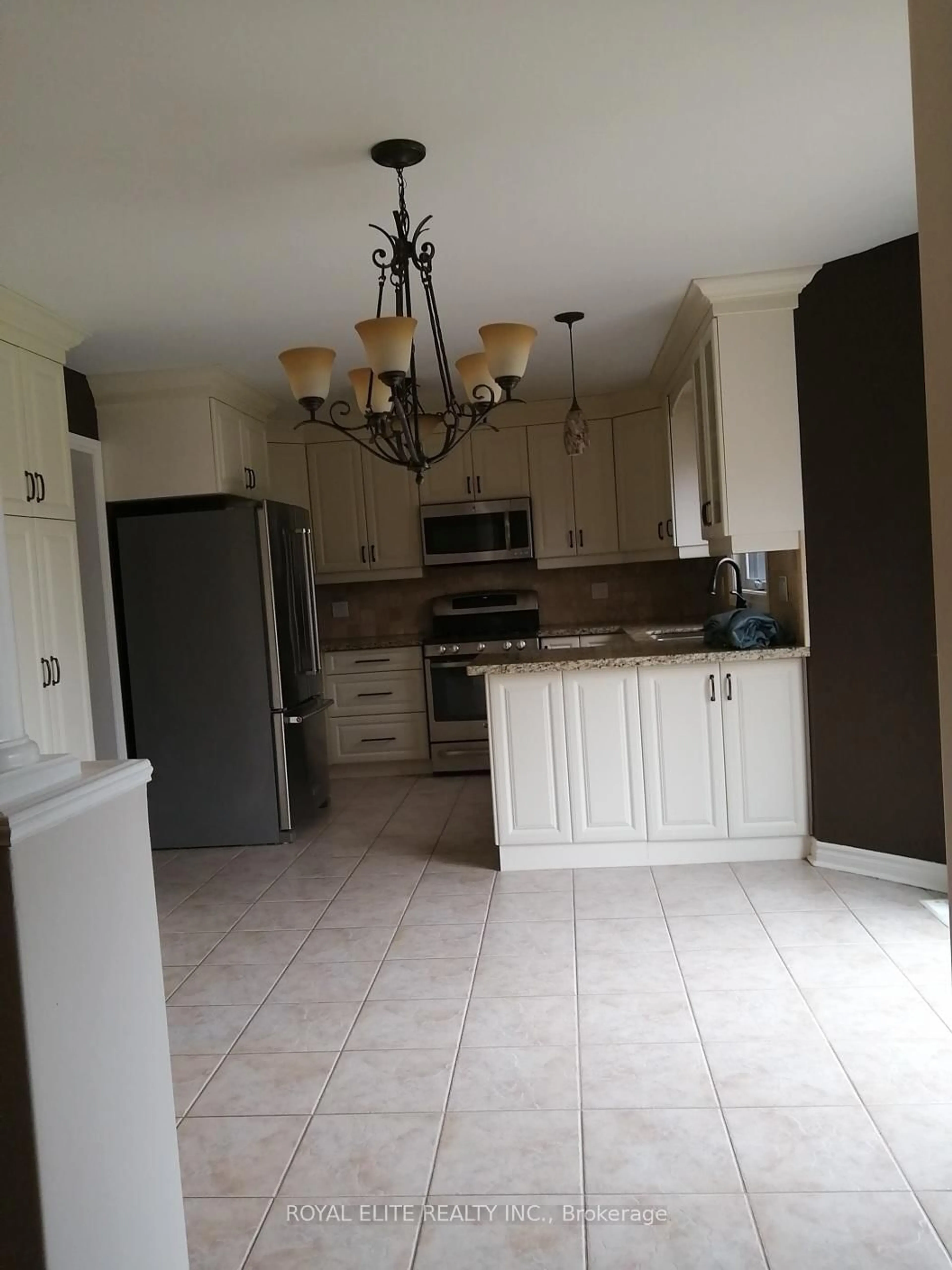 Open concept kitchen, ceramic/tile floor for 311 Stanley St, Barrie Ontario L4M 6X6