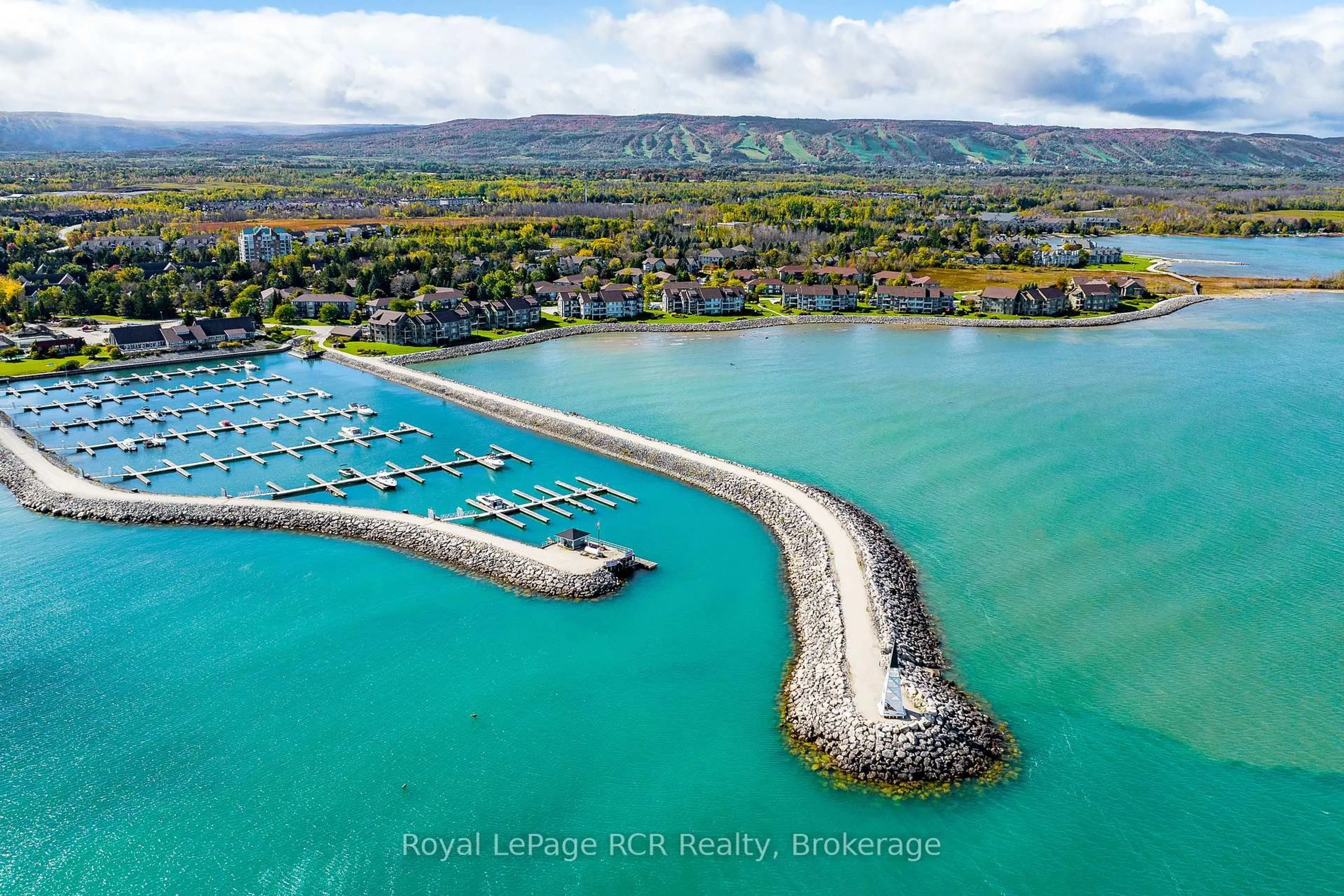 A pic from outside/outdoor area/front of a property/back of a property/a pic from drone, water/lake/river/ocean view for 750 Johnston Park Ave #2006, Collingwood Ontario L9Y 5C7