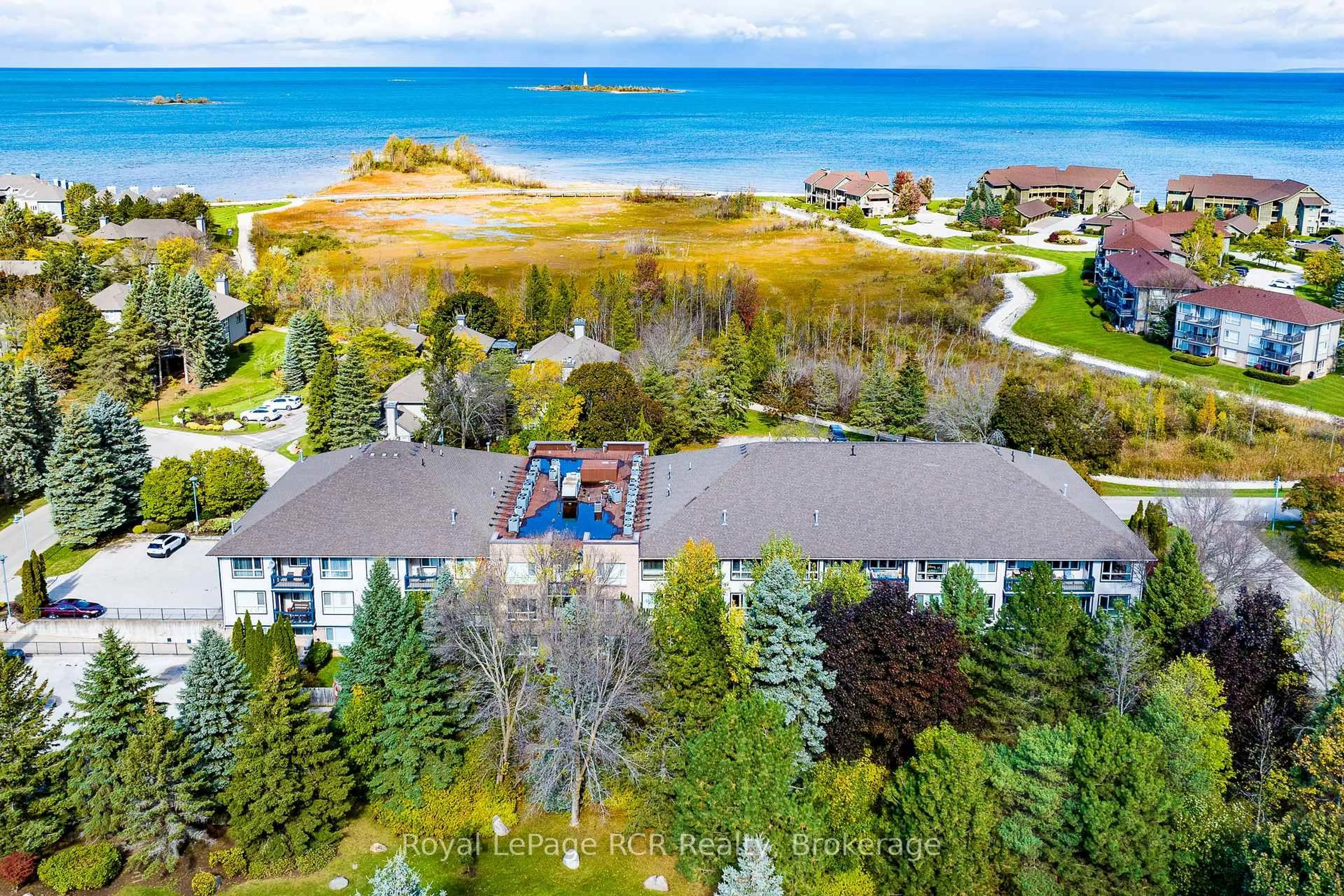 A pic from outside/outdoor area/front of a property/back of a property/a pic from drone, water/lake/river/ocean view for 750 Johnston Park Ave #2006, Collingwood Ontario L9Y 5C7
