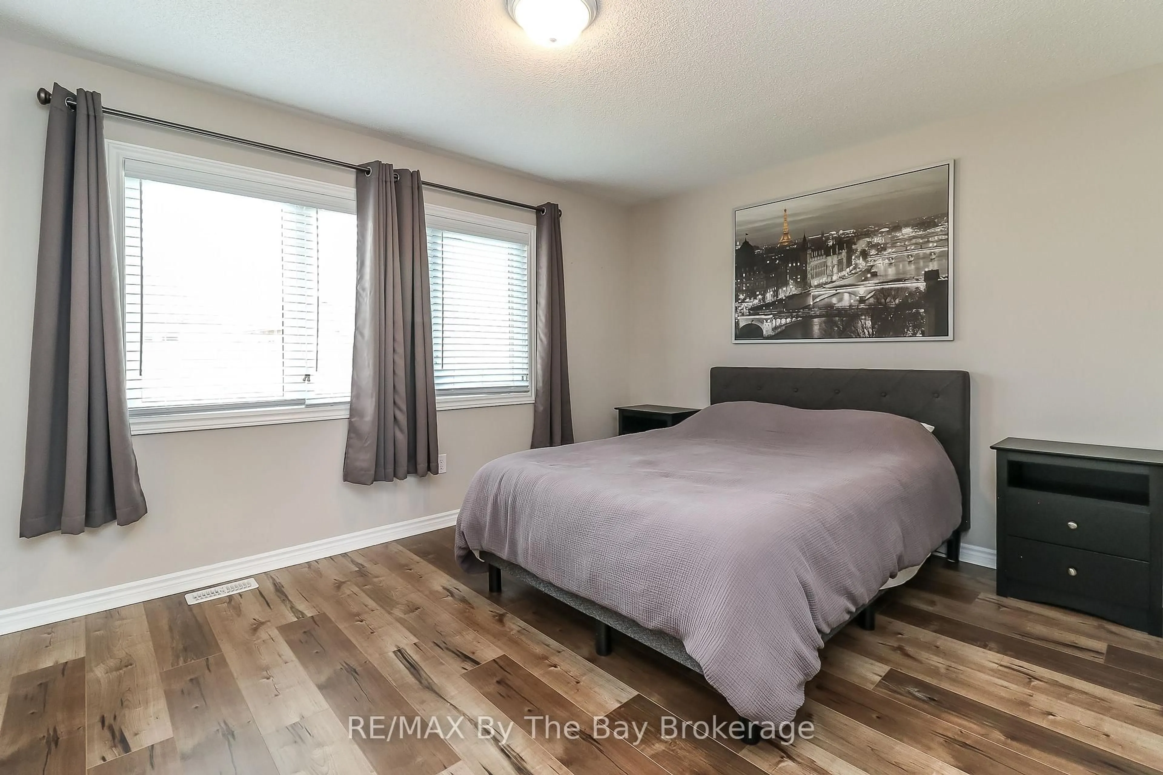 Bedroom with bed, wood/laminate floor for 97 Tracey Lane, Collingwood Ontario L9Y 3Z6